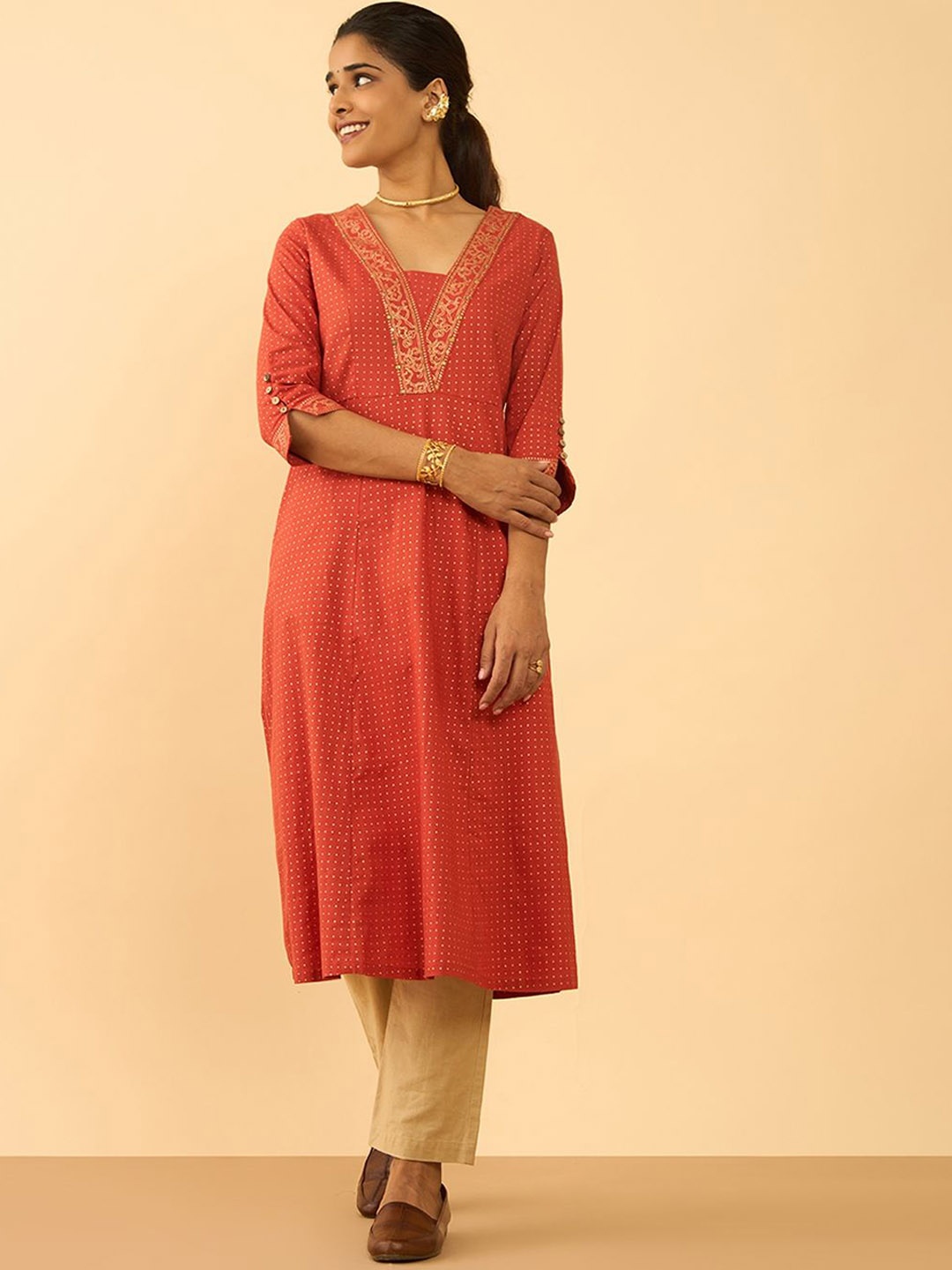 Taneira Polka Dot Printed Beads and Stones Square Neck Pure Cotton A-Line Kurta, Orange
Taneira Polka Dot Printed Beads and Stones Square Neck Pure Cotton A-Line Kurta, Orange