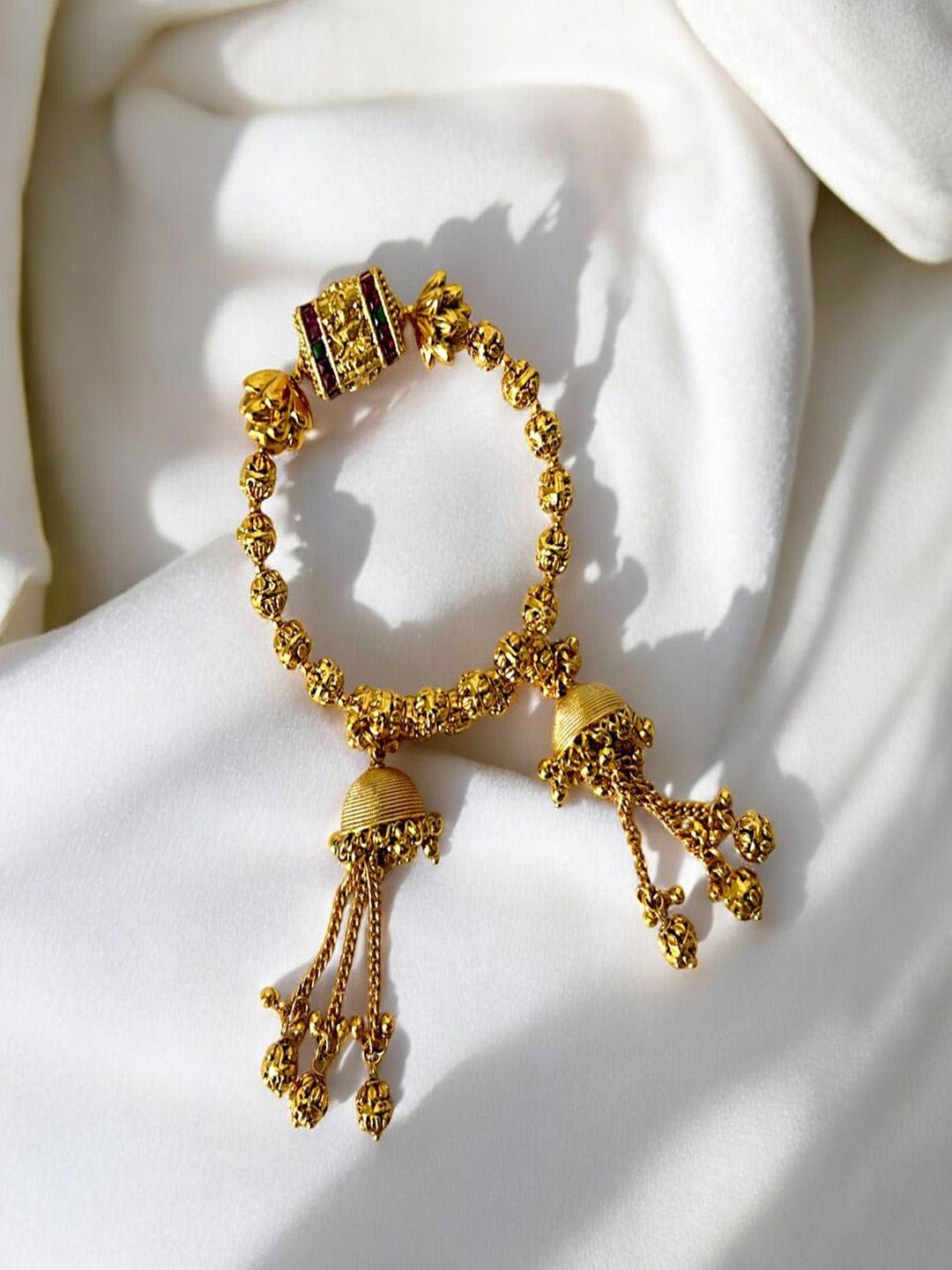 AccessHer Gold-Plated Stone Studded Goddess Lakshmi Jhumka Hanging Adjustable Bangle
AccessHer Gold-Plated Stone Studded Goddess Lakshmi Jhumka Hanging Adjustable Bangle