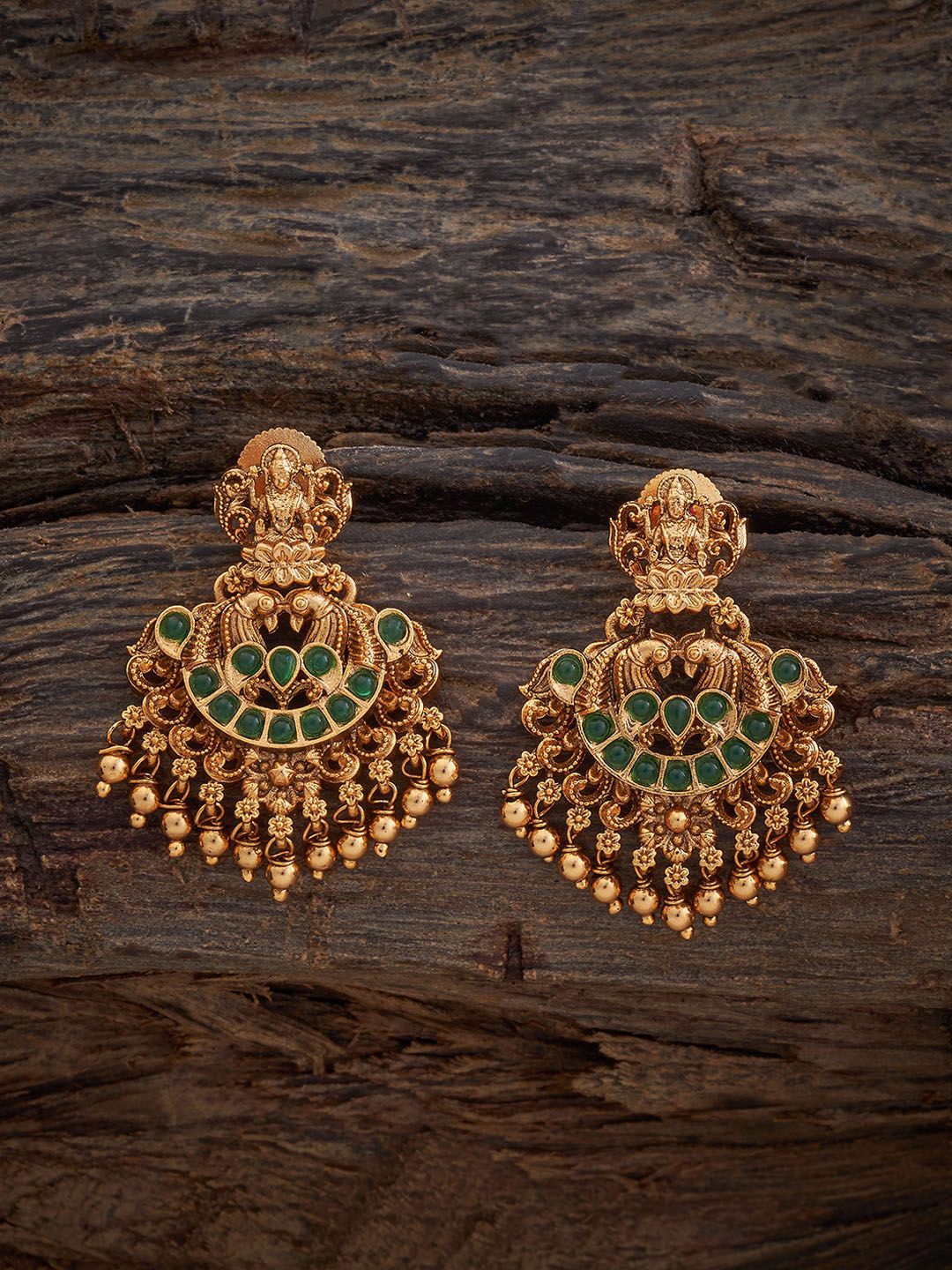 Kushal's Fashion Jewellery Gold-Plated Peacock Shaped Stone Studded Antique Drop Earrings
Kushal's Fashion Jewellery Gold-Plated Peacock Shaped Stone Studded Antique Drop Earrings