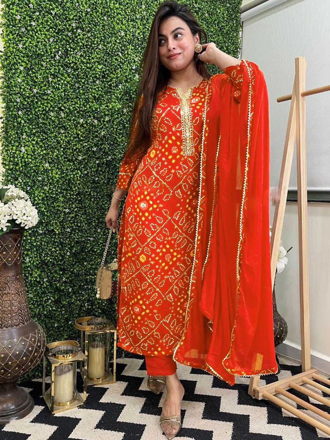 Anni Designer Bandhani Printed Regular Gotta Patti Straight Kurta with Trousers & Dupatta, Orange
Anni Designer Bandhani Printed Regular Gotta Patti Straight Kurta with Trousers & Dupatta, Orange