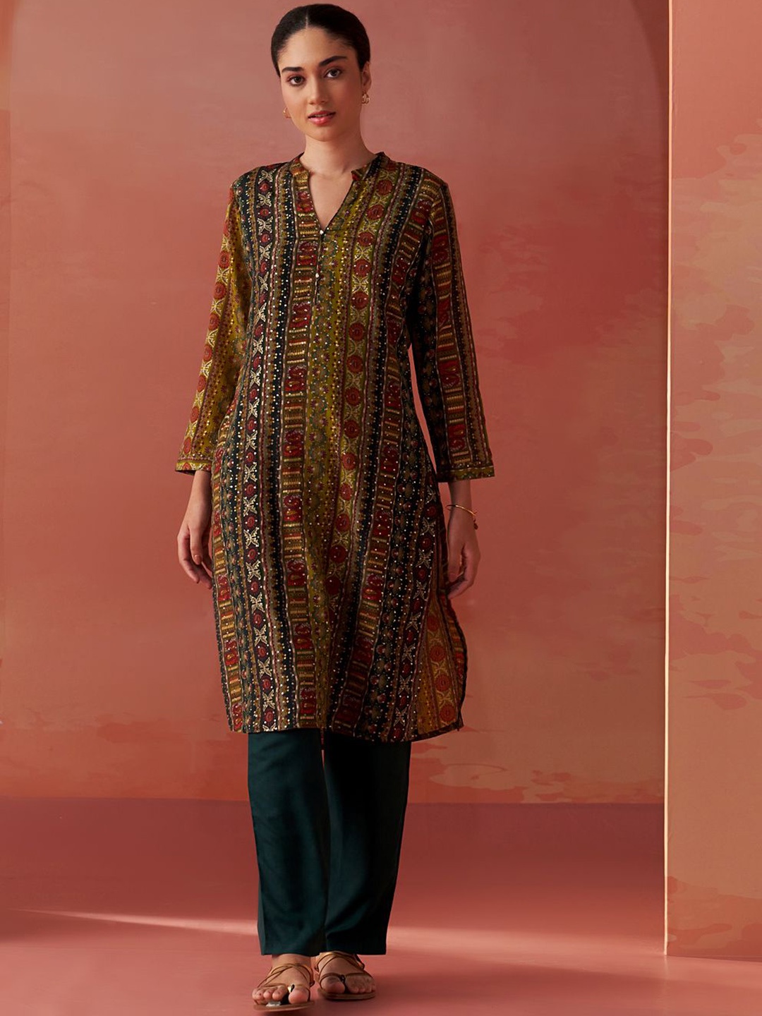 Lakshita Floral Printed Sequinned Mandarin Collar Straight Kurta With Trousers, Green
Lakshita Floral Printed Sequinned Mandarin Collar Straight Kurta With Trousers, Green