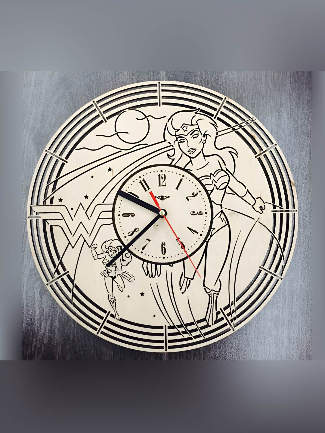 QEZNEF Beige & Black Wonder Women Printed Contemporary Round Shaped Wooden Wall Clock
QEZNEF Beige & Black Wonder Women Printed Contemporary Round Shaped Wooden Wall Clock