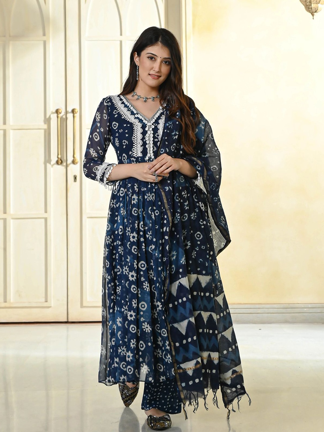 TREDIFIC Floral Printed V-Neck Pure Cotton Anarkali Kurta With Trousers & Dupatta, Navy blue
TREDIFIC Floral Printed V-Neck Pure Cotton Anarkali Kurta With Trousers & Dupatta, Navy blue
