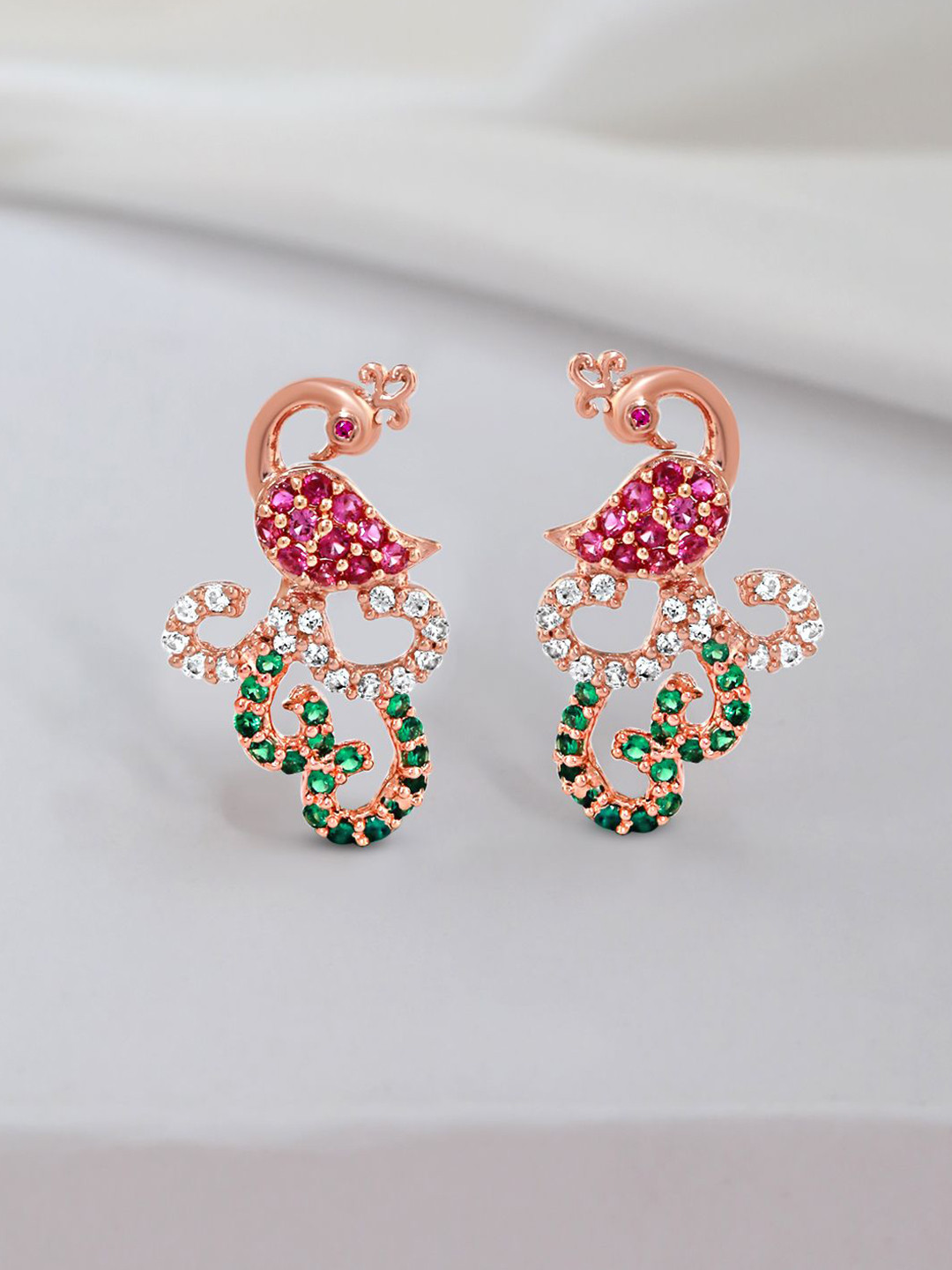 Zavya 925 Sterling Silver Rose Gold-Plated Cubic Zirconia Studded Peacock Shaped Studs
Zavya 925 Sterling Silver Rose Gold-Plated Cubic Zirconia Studded Peacock Shaped Studs
