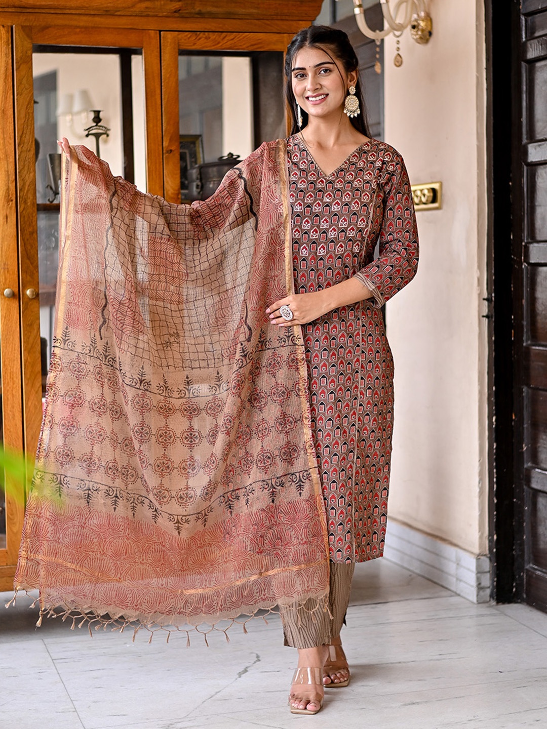 Benaaz Geometric Printed V-Neck Sequinned Pure Cotton Kurta with Trousers & Dupatta, Brown
Benaaz Geometric Printed V-Neck Sequinned Pure Cotton Kurta with Trousers & Dupatta, Brown