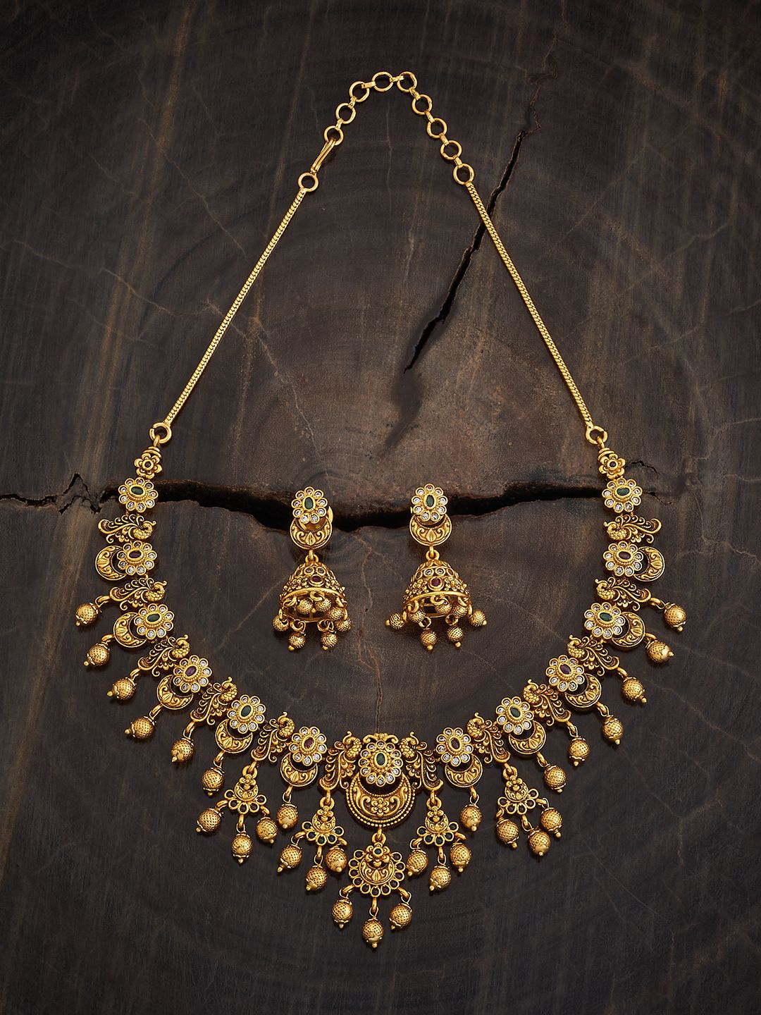 Kushal's Fashion Jewellery Gold-Plated Cubic Zirconia Studded Antique Jewellery Set
Kushal's Fashion Jewellery Gold-Plated Cubic Zirconia Studded Antique Jewellery Set