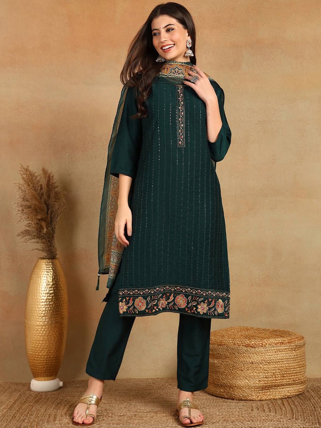 KALINI Women Floral Embroidered Regular Sequinned Kurta with Trousers & With Dupatta, Green
KALINI Women Floral Embroidered Regular Sequinned Kurta with Trousers & With Dupatta, Green