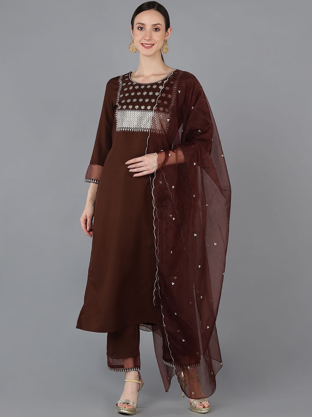 KALINI Women Floral Embroidered Regular Sequinned Kurta with Trousers & With Dupatta, Brown
KALINI Women Floral Embroidered Regular Sequinned Kurta with Trousers & With Dupatta, Brown