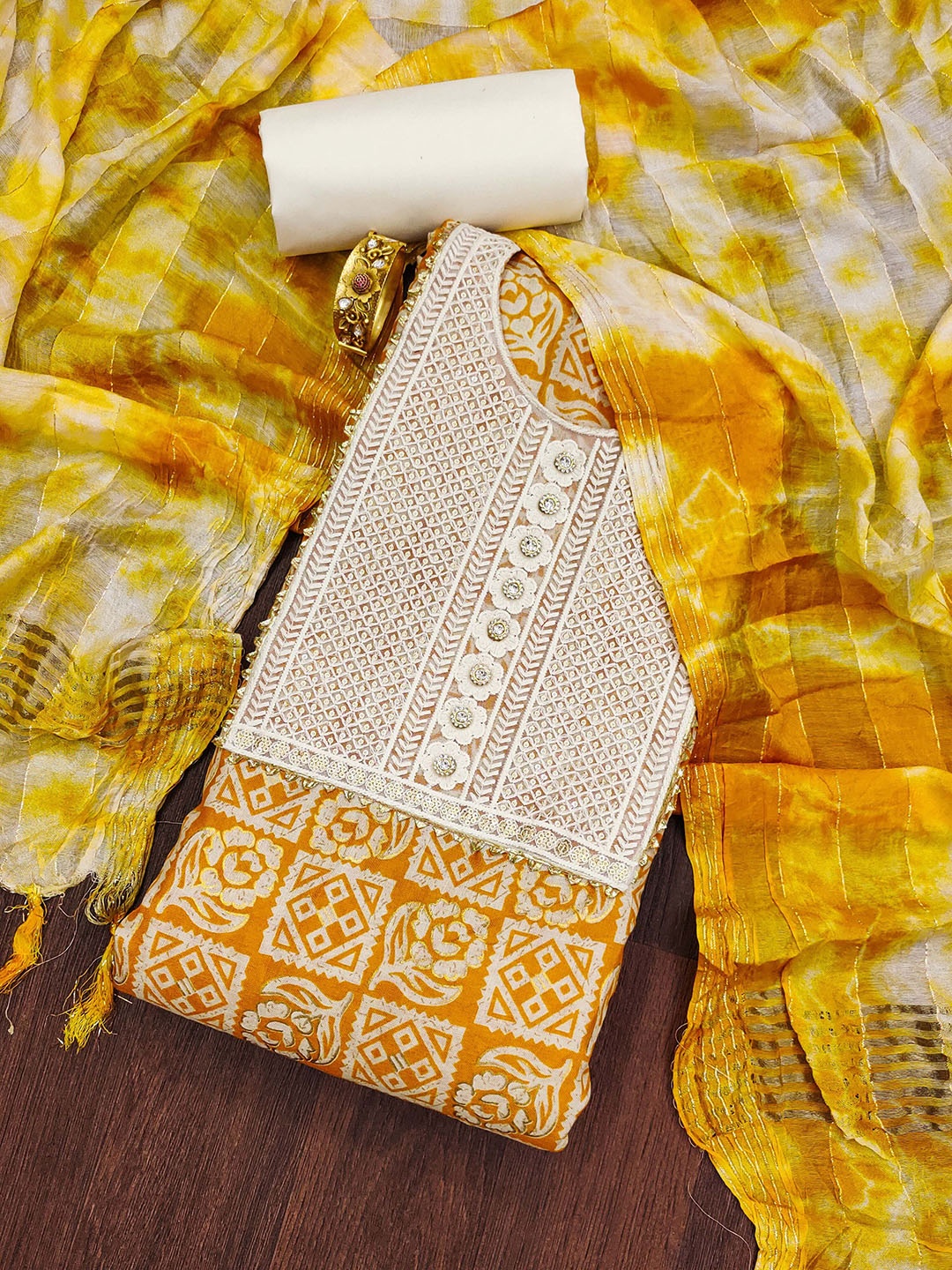 KALINI Floral Embroidered Sequinned Pure Cotton Unstitched Dress Material, Yellow
KALINI Floral Embroidered Sequinned Pure Cotton Unstitched Dress Material, Yellow