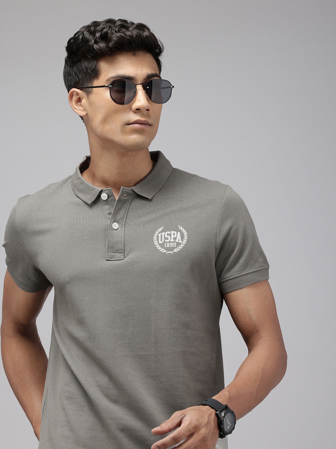 U.S. Polo Assn. Denim Co. Polo Collar Pure Cotton Slim Fit T-shirt with Minimal Print, Grey
U.S. Polo Assn. Denim Co. Polo Collar Pure Cotton Slim Fit T-shirt with Minimal Print, Grey