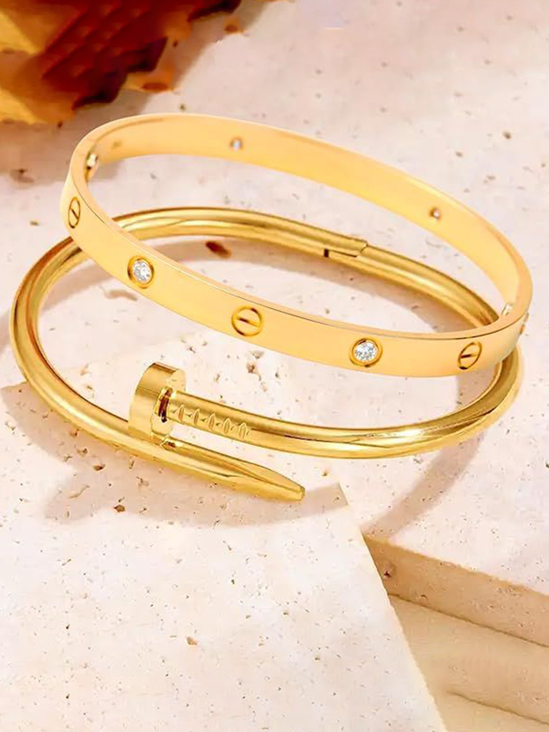 MEENAZ Set Of 2 Gold-Plated Stainless Steel Anti Tarnish Stone Studded Kada Bracelets
MEENAZ Set Of 2 Gold-Plated Stainless Steel Anti Tarnish Stone Studded Kada Bracelets