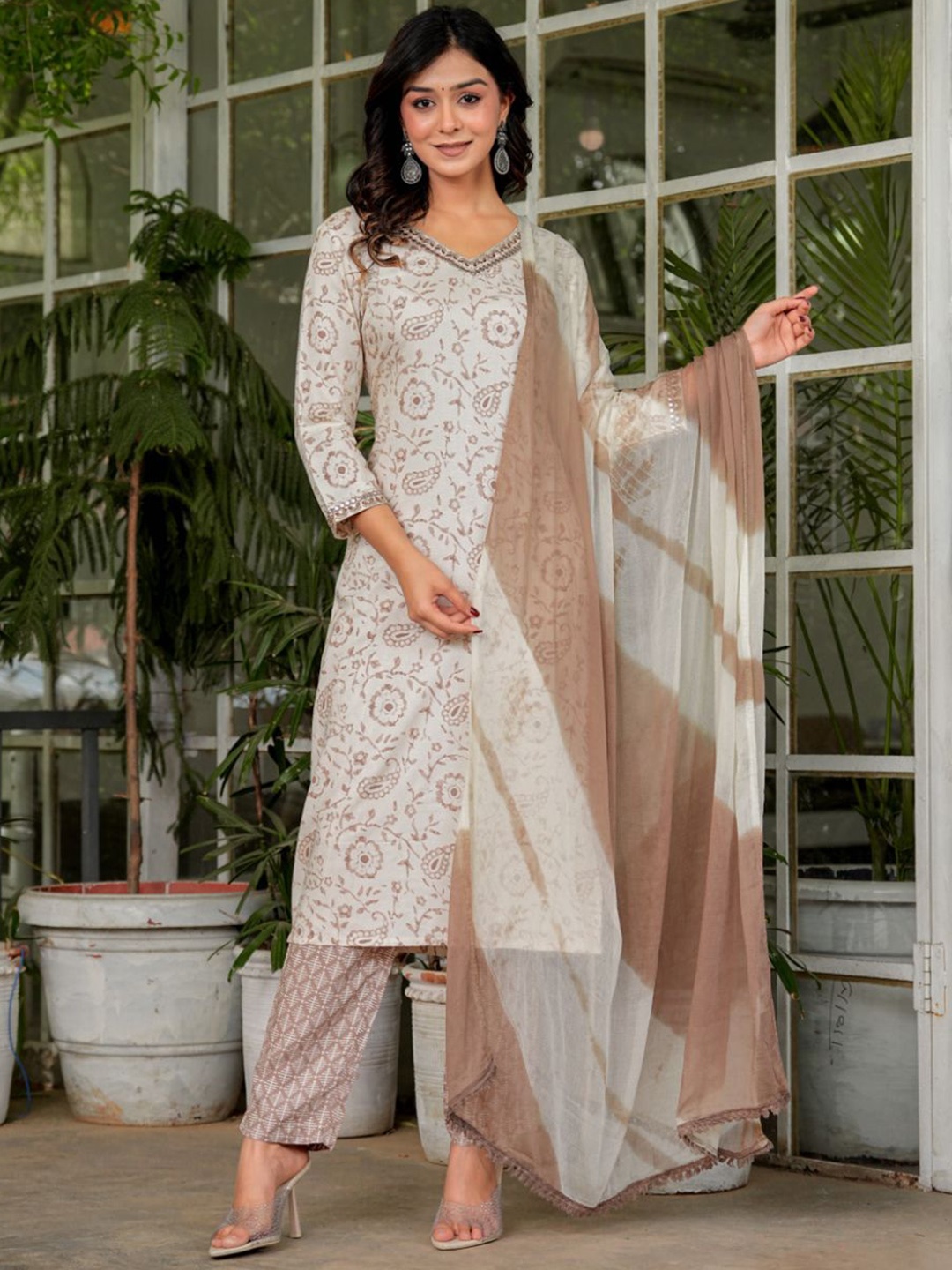 KALINI Floral Printed Regular Mirror Work Straight Kurta with Palazzos & With Dupatta, Brown
KALINI Floral Printed Regular Mirror Work Straight Kurta with Palazzos & With Dupatta, Brown