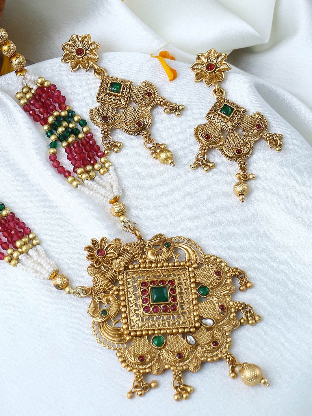 Adwitiya Collection Gold-Plated Stone-Studded & Beaded Antique Peacock Motif Jewellery Set
Adwitiya Collection Gold-Plated Stone-Studded & Beaded Antique Peacock Motif Jewellery Set