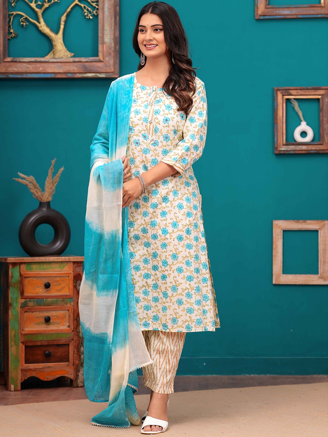 YUSRA Floral Printed Mirror Work Round Neck Straight Kurta with Trousers & Dupatta, Blue
YUSRA Floral Printed Mirror Work Round Neck Straight Kurta with Trousers & Dupatta, Blue
