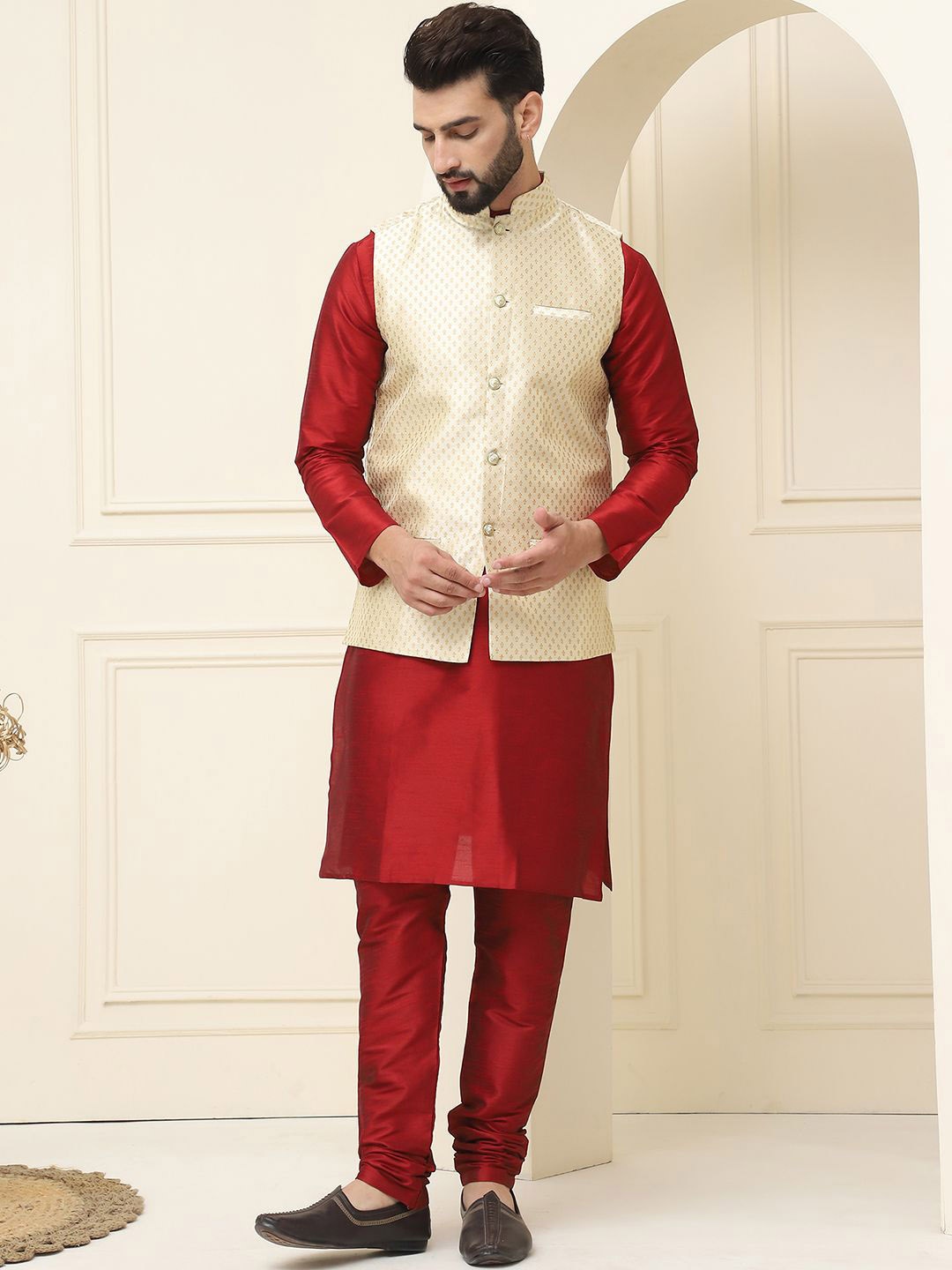SOJANYA Mandarin Collar Zari Silk Cotton Straight Kurta with Pyjamas & Nehru jacket, Maroon
SOJANYA Mandarin Collar Zari Silk Cotton Straight Kurta with Pyjamas & Nehru jacket, Maroon