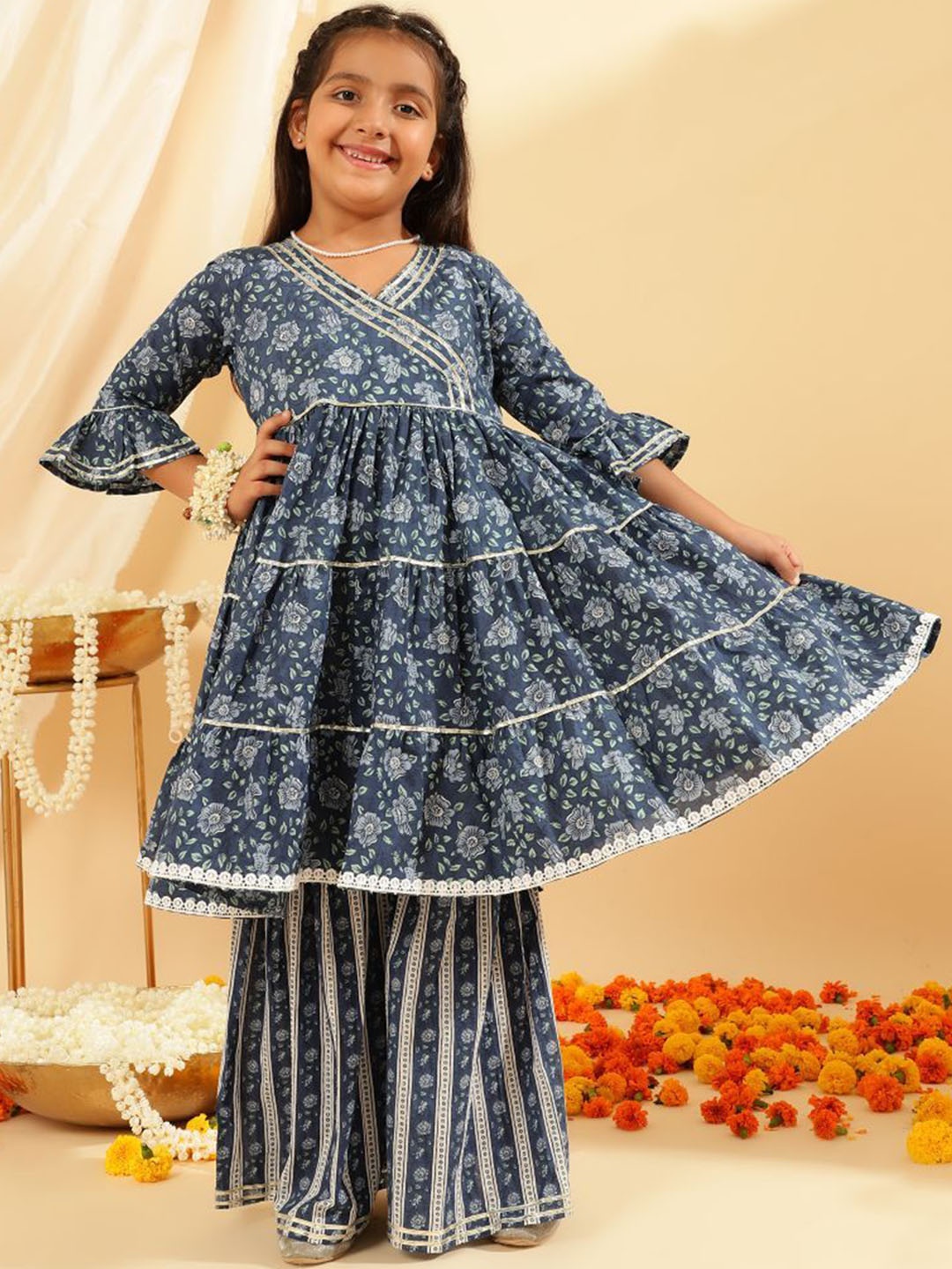 BANDIA Girls Floral Printed Tiered Gotta Patti Pure Cotton Anarkali Kurta with Sharara, Blue
BANDIA Girls Floral Printed Tiered Gotta Patti Pure Cotton Anarkali Kurta with Sharara, Blue