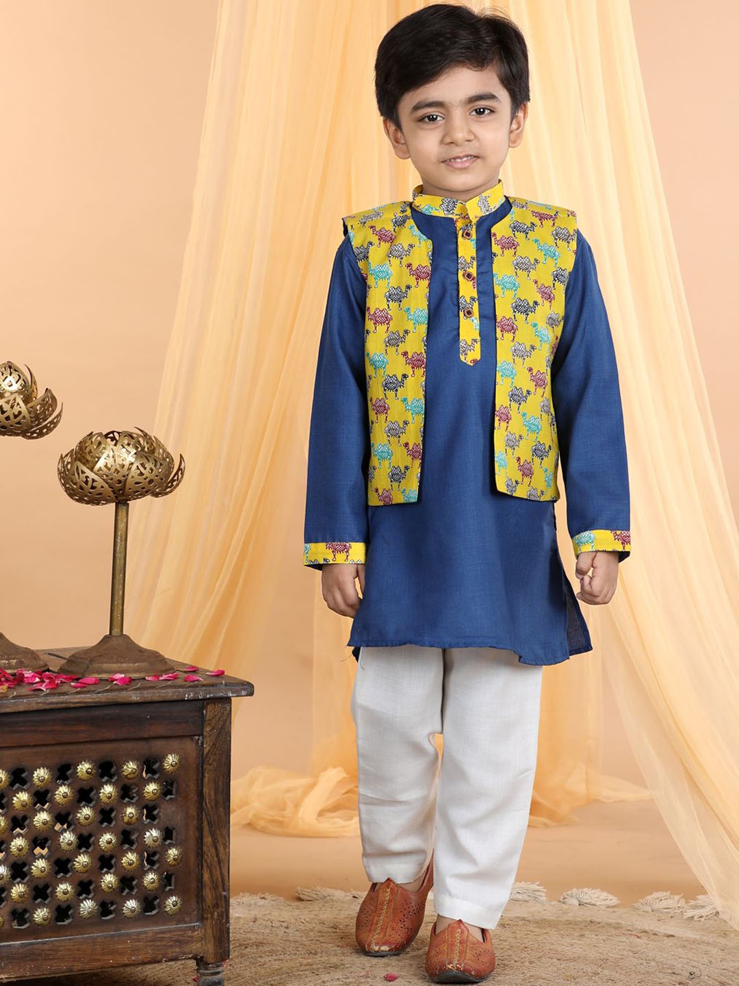 Here&Now X Kinder Kids Boys Mandarin Collar Pure Cotton Kurta with Trouser and Jacket, Blue
Here&Now X Kinder Kids Boys Mandarin Collar Pure Cotton Kurta with Trouser and Jacket, Blue