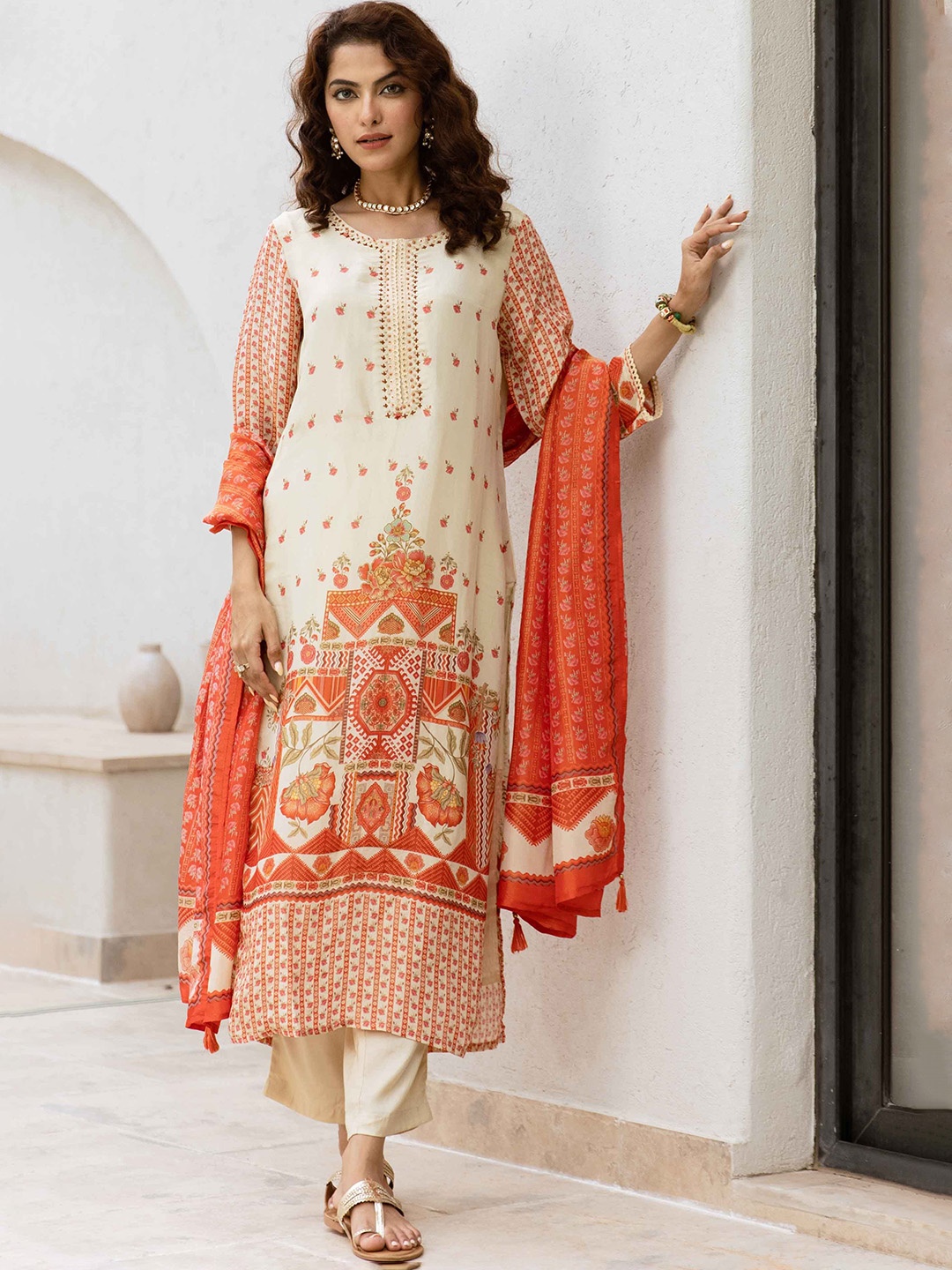 KALINI Women Floral Printed Regular Beads and Stones Kurta with Trousers & Dupatta, Cream
KALINI Women Floral Printed Regular Beads and Stones Kurta with Trousers & Dupatta, Cream