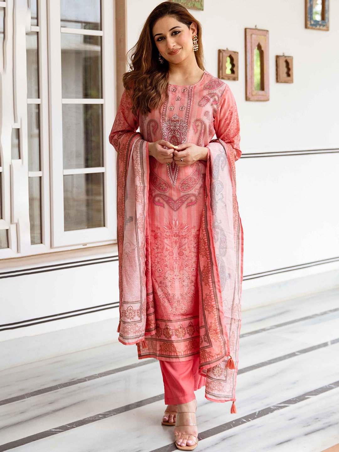 KALINI Women Floral Printed Regular Beads and Stones Kurta with Trousers & Dupatta, Peach
KALINI Women Floral Printed Regular Beads and Stones Kurta with Trousers & Dupatta, Peach