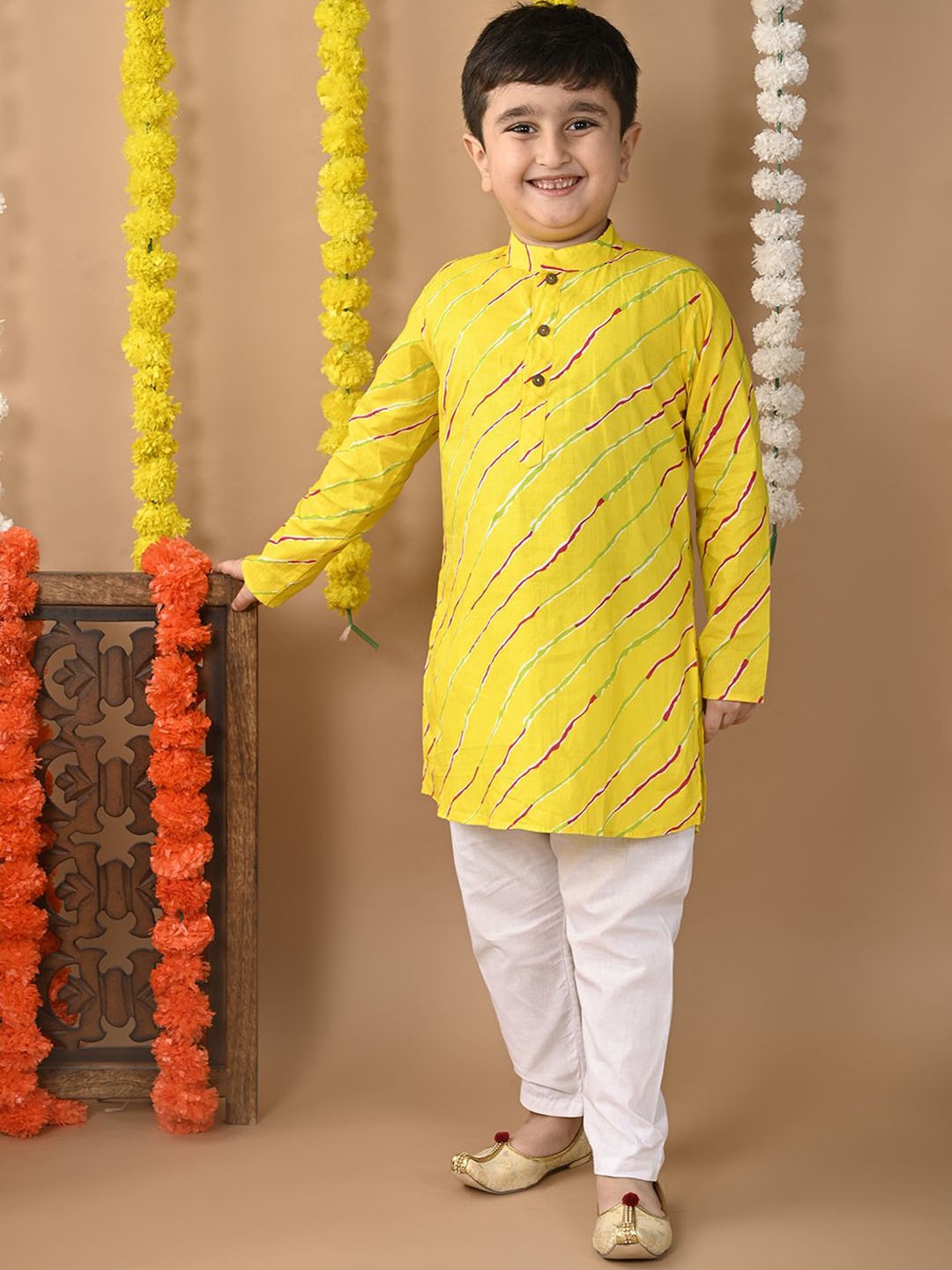 Sangria Boys Leheriya Printed Mandarin Collar Pure Cotton Straight Kurta and Trouser, Yellow
Sangria Boys Leheriya Printed Mandarin Collar Pure Cotton Straight Kurta and Trouser, Yellow