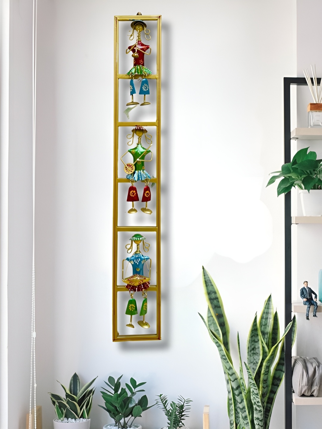 ANSHIKA INTERNATIONAL Gold-Toned & Green Printed Rajasthani Musician Metal Wall Decor
ANSHIKA INTERNATIONAL Gold-Toned & Green Printed Rajasthani Musician Metal Wall Decor