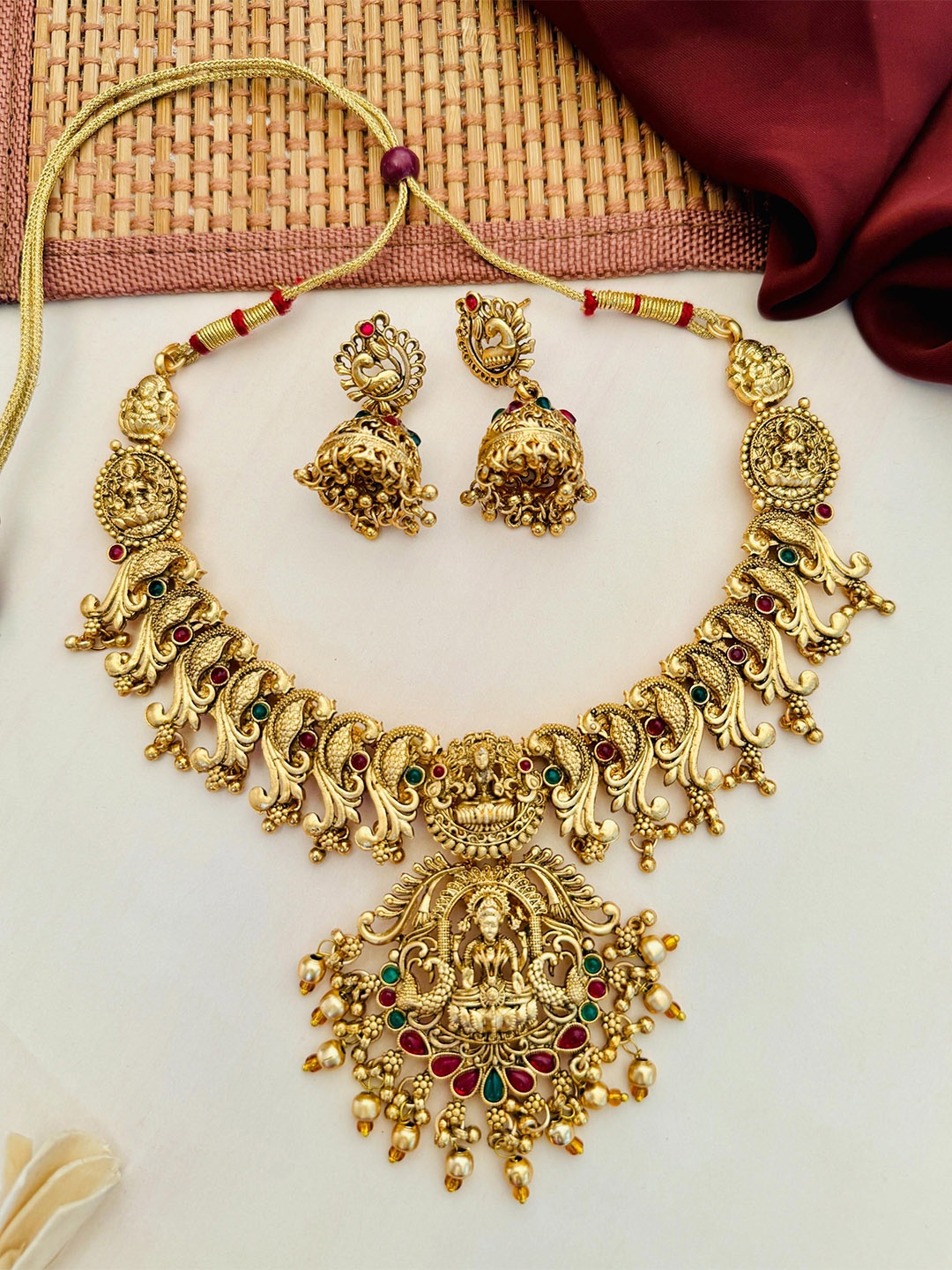 ABDESIGNS Sophisticated Gold-Plated Kundan Studded & Beaded Lakshmi God Jewellery Set
ABDESIGNS Sophisticated Gold-Plated Kundan Studded & Beaded Lakshmi God Jewellery Set