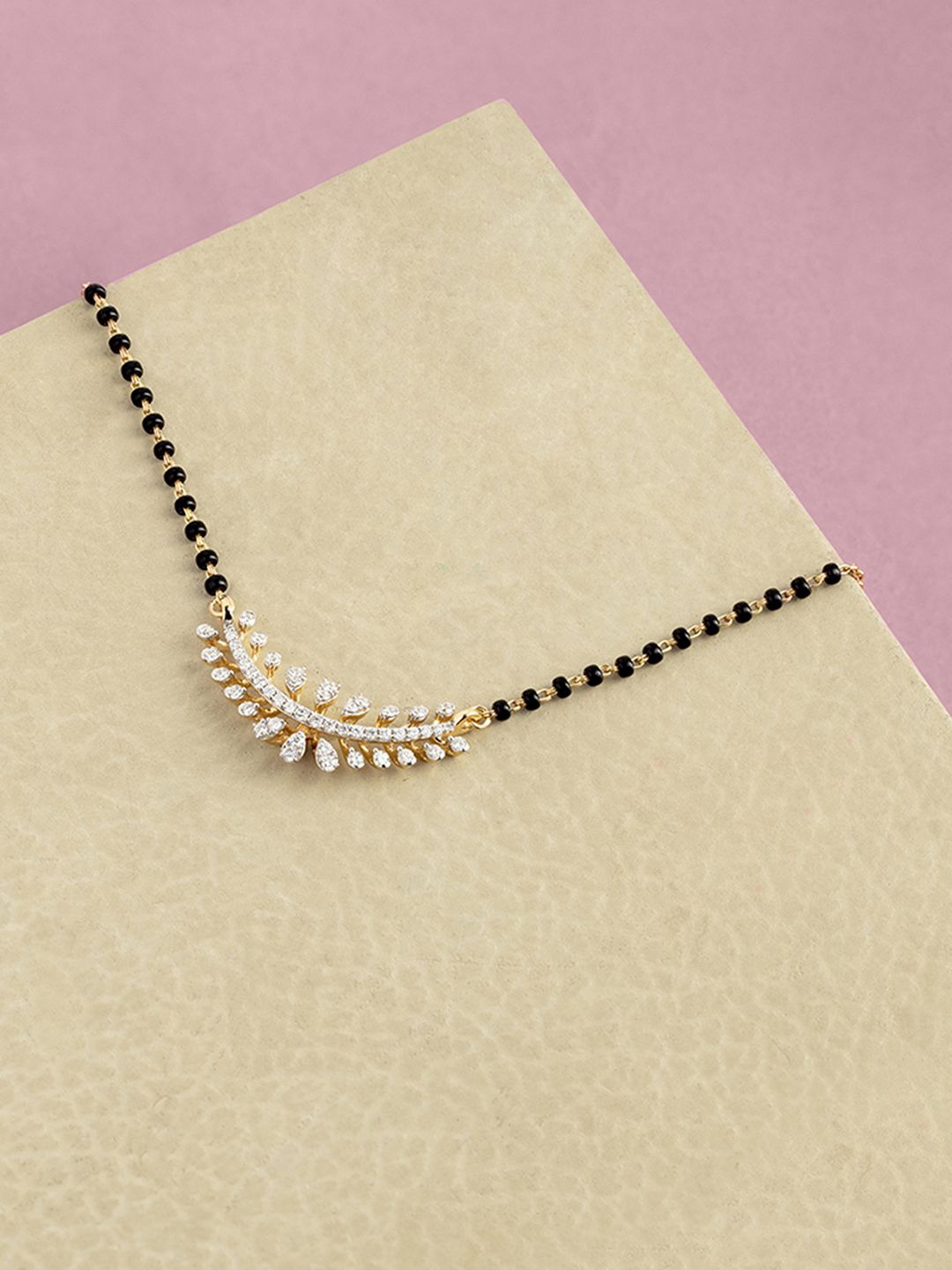 Mia by Tanishq Women Crescent Sparkle 18KT BIS Hall Mark Gold & Diamond Mangalsutra-5.89gm, Yellow
Mia by Tanishq Women Crescent Sparkle 18KT BIS Hall Mark Gold & Diamond Mangalsutra-5.89gm, Yellow