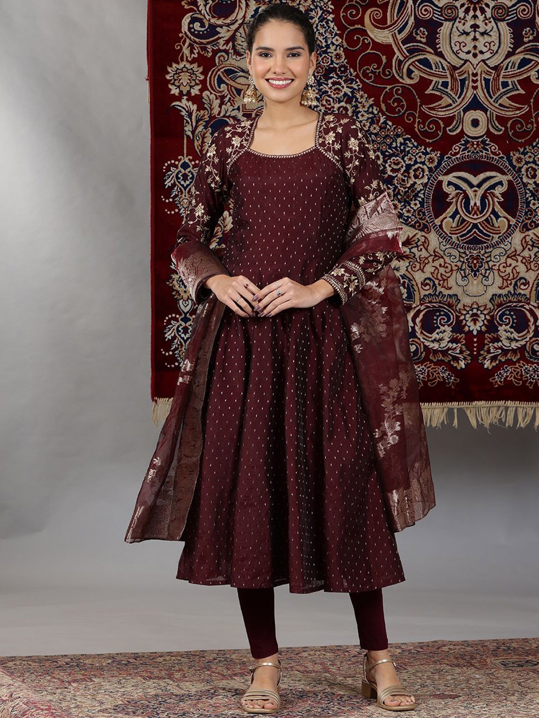AURELIA Floral Self Design Thread Work Panelled A-Line Kurta With Leggings and Dupatta, Maroon
AURELIA Floral Self Design Thread Work Panelled A-Line Kurta With Leggings and Dupatta, Maroon