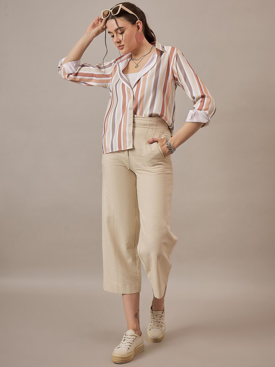 The Roadster Lifestyle Co. Women Spread Collar Vertical Striped Crepe Casual Shirt, Beige
The Roadster Lifestyle Co. Women Spread Collar Vertical Striped Crepe Casual Shirt, Beige