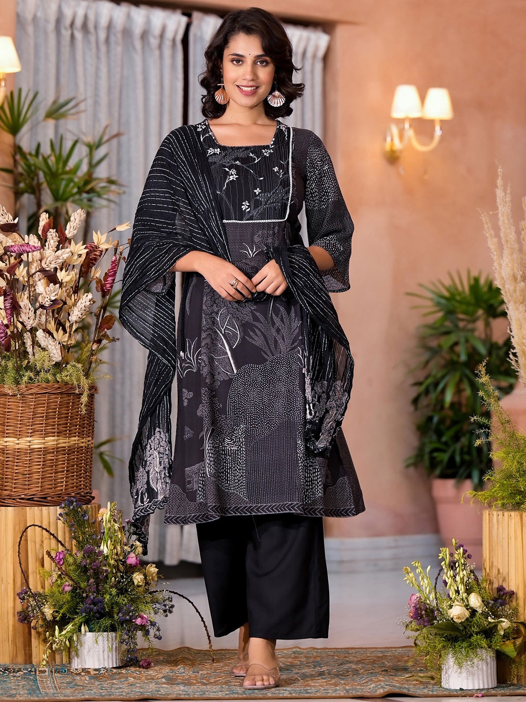 Juniper Floral Printed Panelled Sequinned A-Line Kurta with Trousers & Dupatta, Black
Juniper Floral Printed Panelled Sequinned A-Line Kurta with Trousers & Dupatta, Black