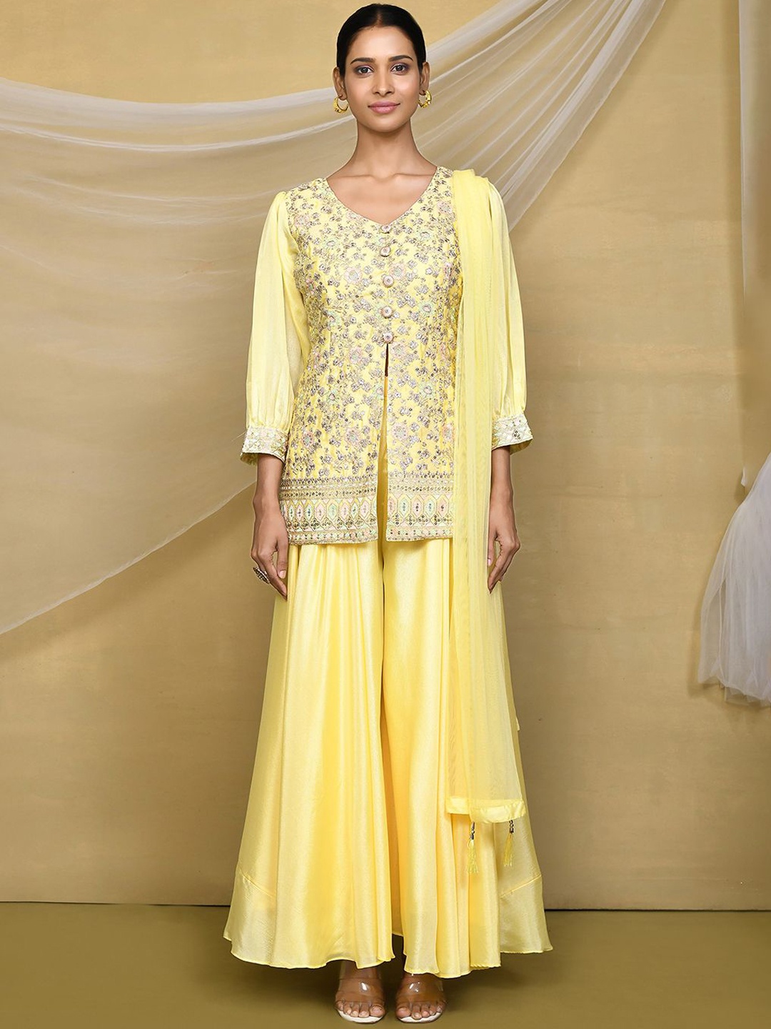 Samyukta Singhani Ethnic Motifs Embroidered Silk Georgette Kurti with Trouser, Yellow
Samyukta Singhani Ethnic Motifs Embroidered Silk Georgette Kurti with Trouser, Yellow