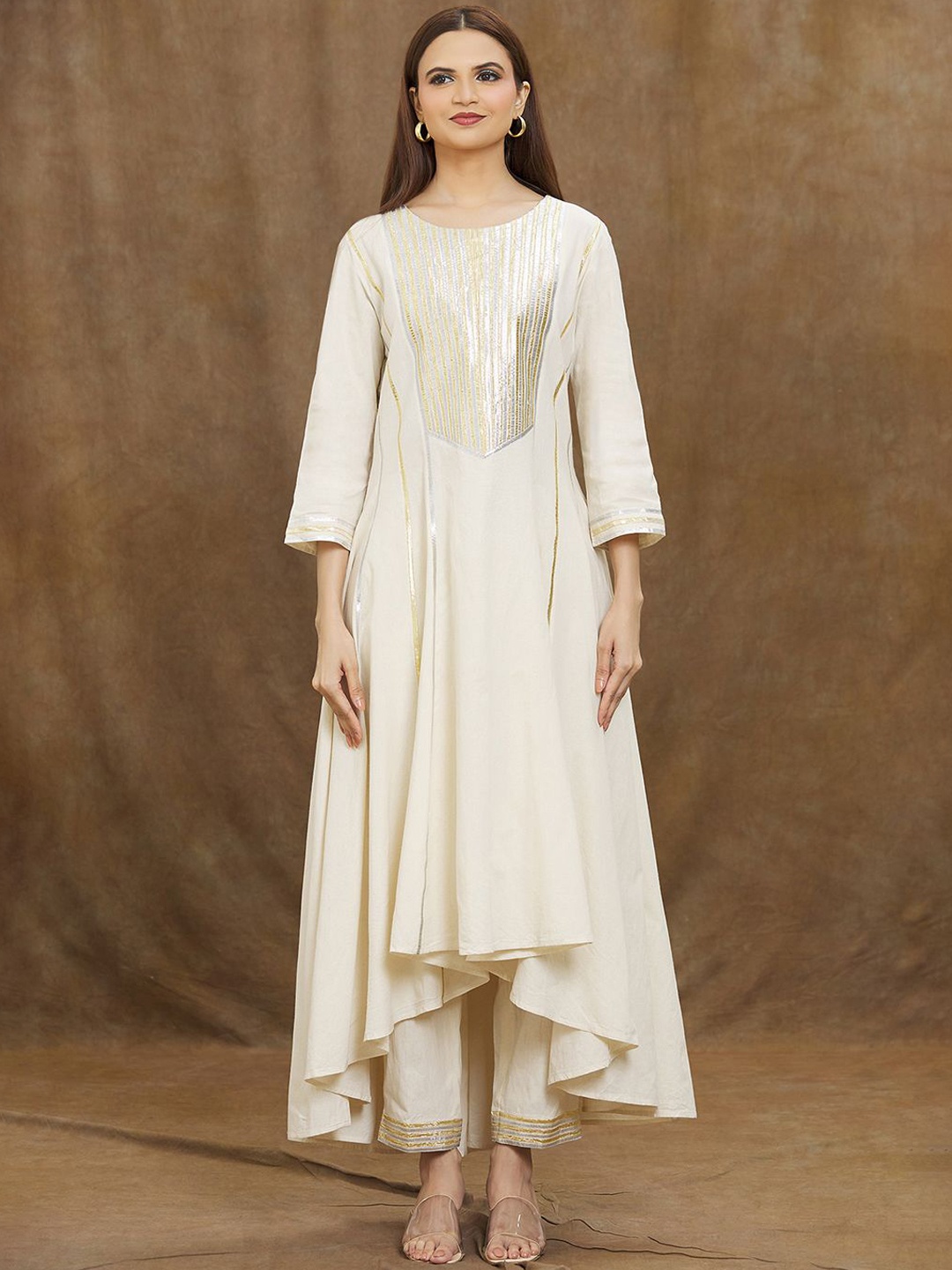 Samyukta Singhani Striped Embroidered Gotta Patti Anarkali Kurta with Trousers, White
Samyukta Singhani Striped Embroidered Gotta Patti Anarkali Kurta with Trousers, White