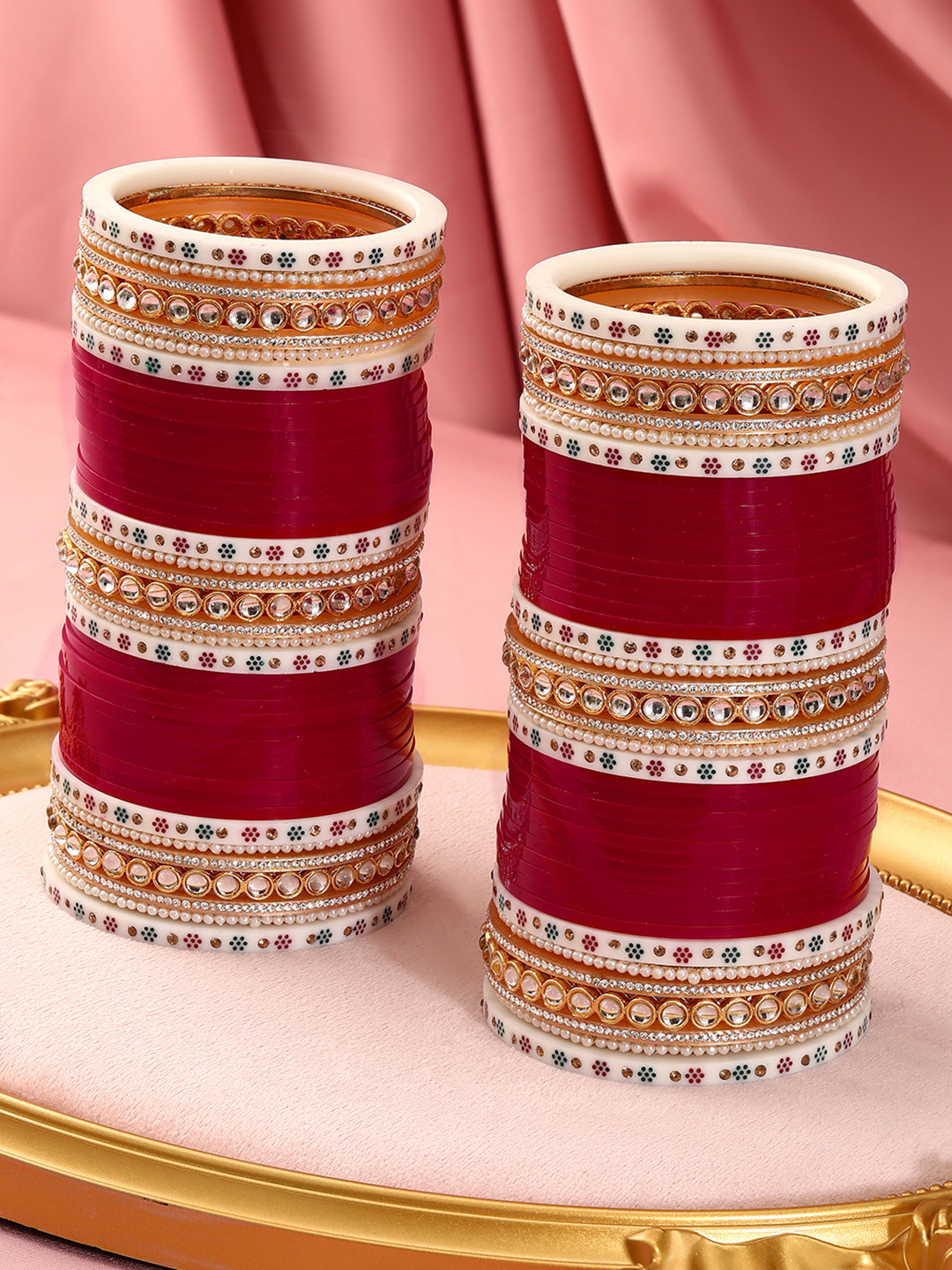 Rubans Set of 94 Bridal Red & White Chura Bangles with Kundan & Gold Detailing
Rubans Set of 94 Bridal Red & White Chura Bangles with Kundan & Gold Detailing