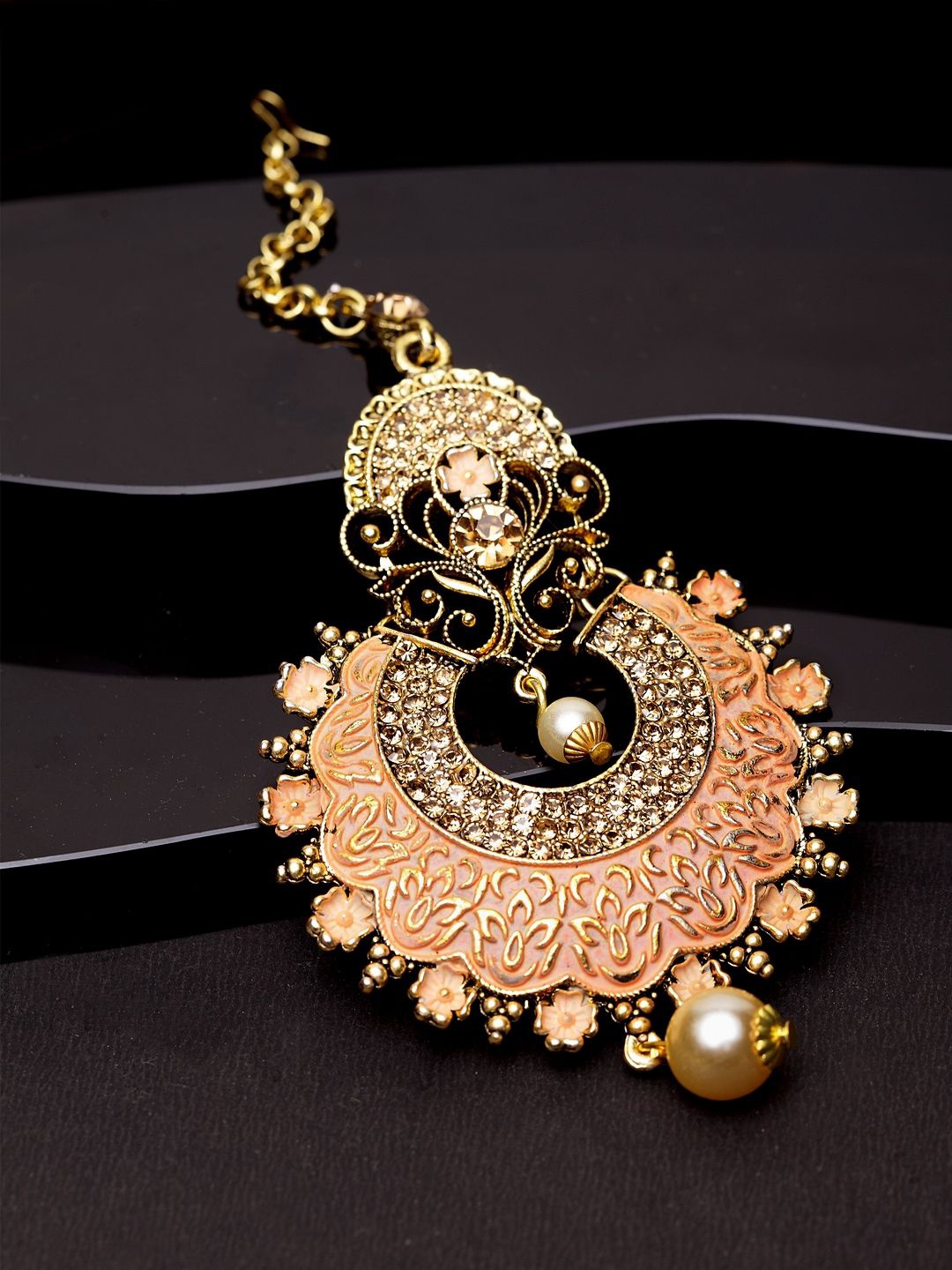 ANIKAS CREATION Gold-Plated Artificial Stones and Beads Studded Maang Tikka Head Jewellery, Peach
ANIKAS CREATION Gold-Plated Artificial Stones and Beads Studded Maang Tikka Head Jewellery, Peach