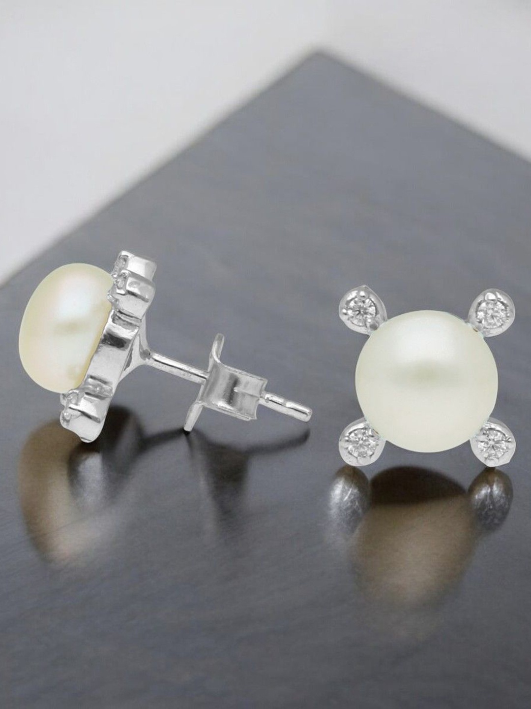 Sri Jagdamba Pearls Dealer 925 Sterling Silver Stones Studded & Pearl Circular Studs
Sri Jagdamba Pearls Dealer 925 Sterling Silver Stones Studded & Pearl Circular Studs