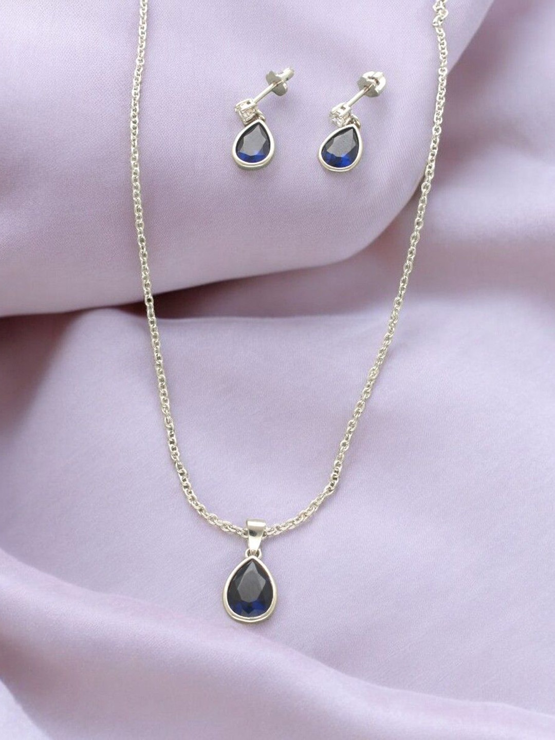 Sri Jagdamba Pearls Dealer 925 Sterling Silver-Plated CZ Stone-Studded Jewellery Set
Sri Jagdamba Pearls Dealer 925 Sterling Silver-Plated CZ Stone-Studded Jewellery Set