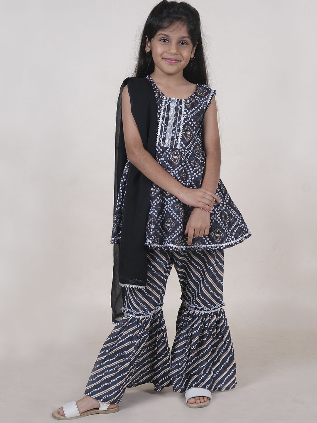 KiddoPanti Girls Bandhani Printed Pure Cotton A-Line Kurti With Sharara & Dupatta, Black
KiddoPanti Girls Bandhani Printed Pure Cotton A-Line Kurti With Sharara & Dupatta, Black