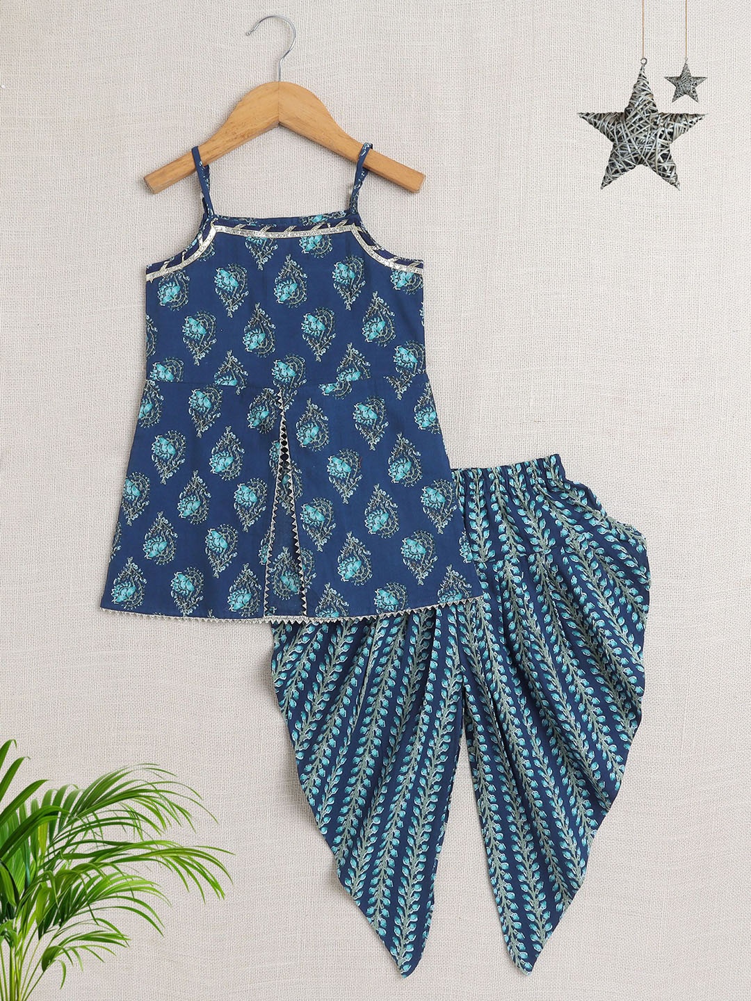 The Magic Wand Girls Floral Printed Gotta Patti Shoulder Straps Kurta with Dhoti Pants, Navy blue
The Magic Wand Girls Floral Printed Gotta Patti Shoulder Straps Kurta with Dhoti Pants, Navy blue
