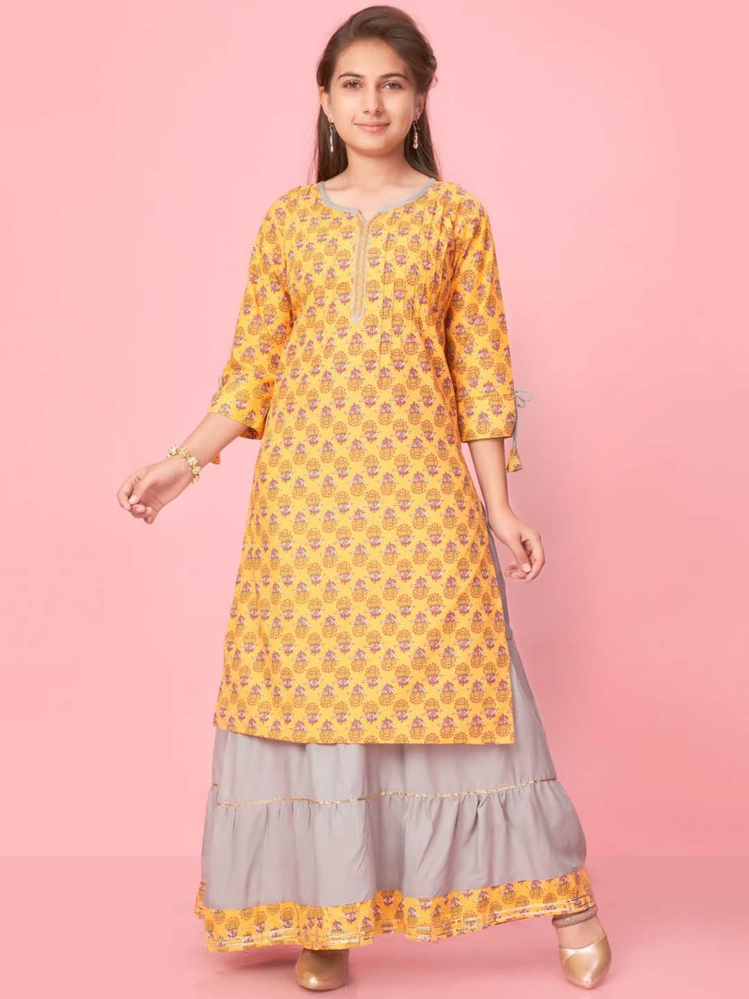 BAESD Girls Floral Printed Notch Neck Pure Cotton Straight Kurta with Sharara, Yellow
BAESD Girls Floral Printed Notch Neck Pure Cotton Straight Kurta with Sharara, Yellow