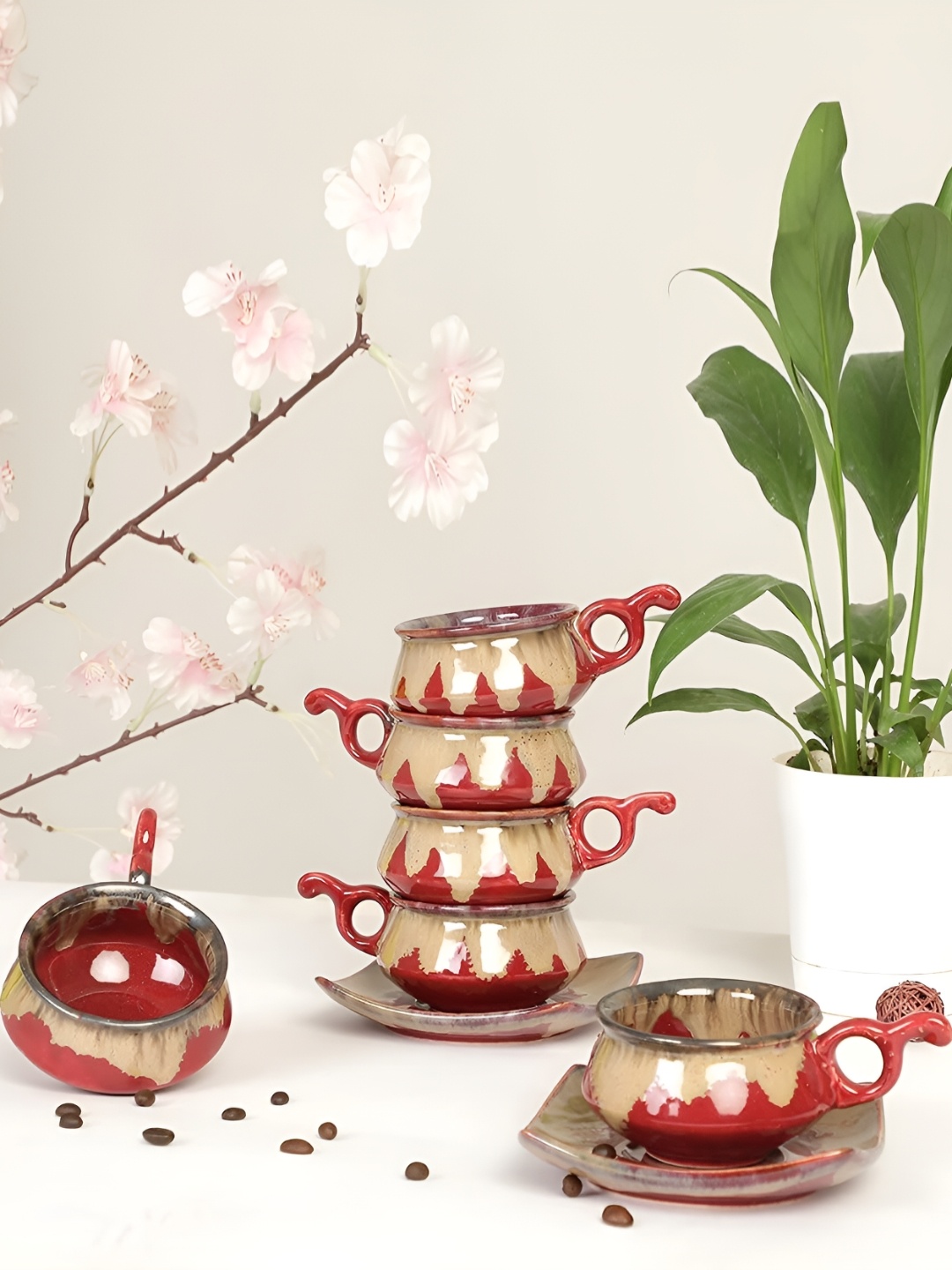 AMALAFIEE CERAMICS Red & Beige 6 Pieces Printed Ceramic Cups & Saucers Set 240 ml Each
AMALAFIEE CERAMICS Red & Beige 6 Pieces Printed Ceramic Cups & Saucers Set 240 ml Each