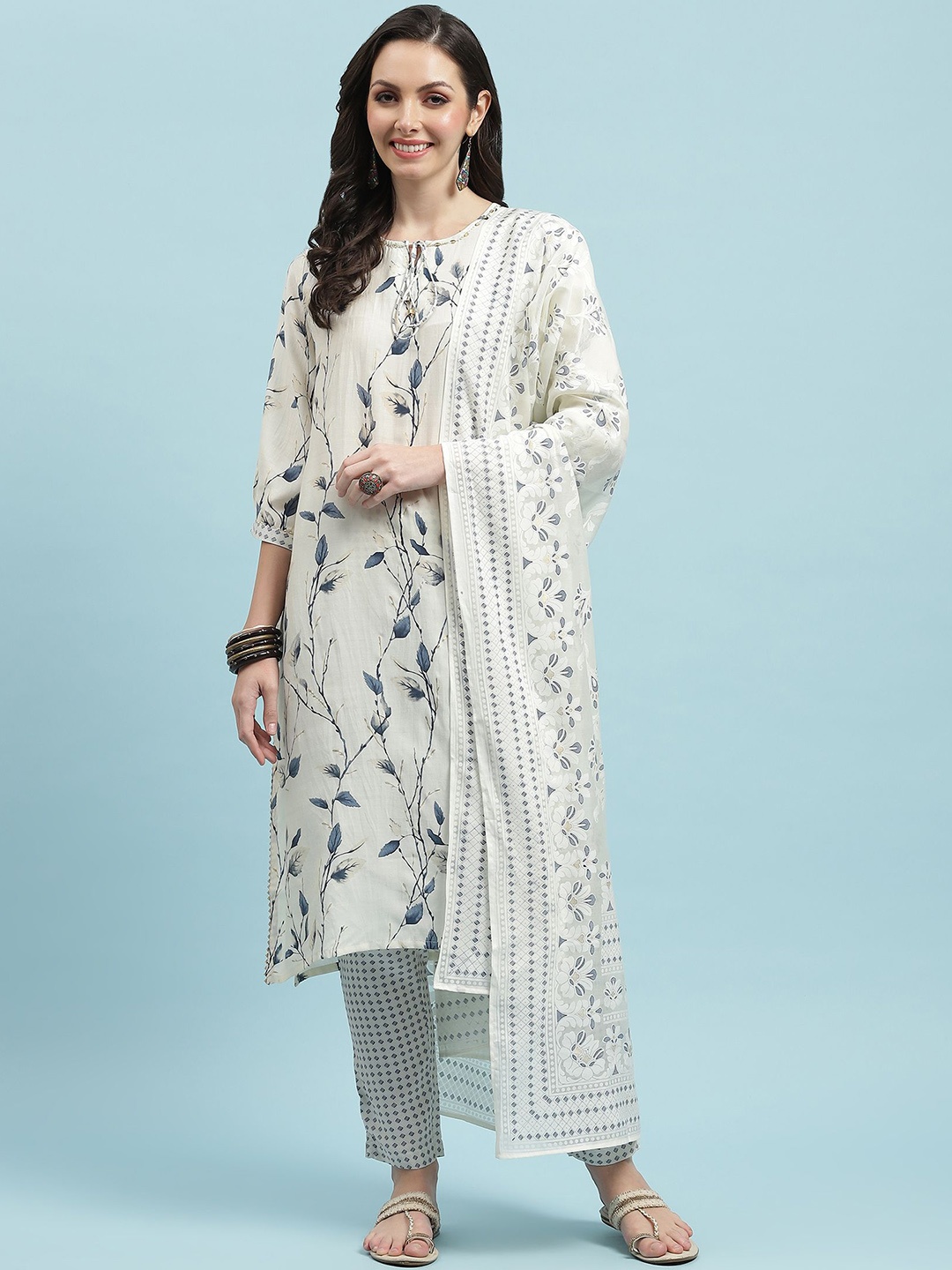 Shree Floral Printed Tie-Up Neck Liva Straight Kurta With Trousers & Dupatta, Off white
Shree Floral Printed Tie-Up Neck Liva Straight Kurta With Trousers & Dupatta, Off white