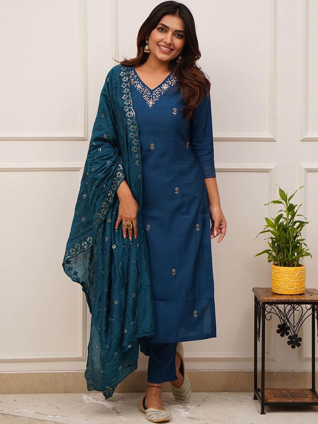 KALINI Floral Embroidered V-Neck Sequinned Straight Kurta with Trousers & With Dupatta, Blue
KALINI Floral Embroidered V-Neck Sequinned Straight Kurta with Trousers & With Dupatta, Blue