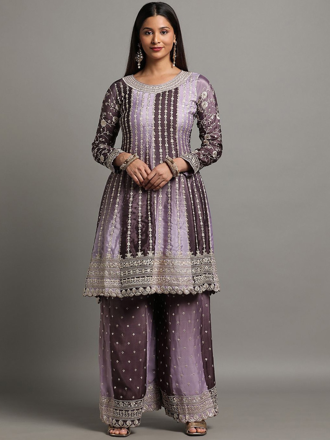 Miss Ethnik Ethnic Motifs Embroidered Sequinned A-Line Kurta with Sharara & Dupatta, Purple
Miss Ethnik Ethnic Motifs Embroidered Sequinned A-Line Kurta with Sharara & Dupatta, Purple