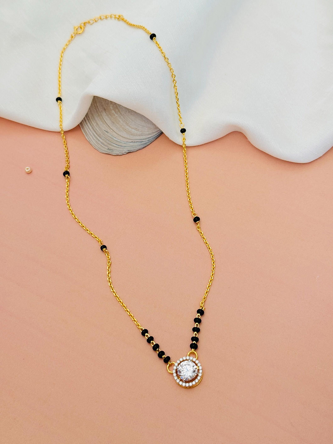 DURGA INTERNATIONAL 925 Sterling Silver Gold-Plated Stones Studded and Beaded Mangalsutra
DURGA INTERNATIONAL 925 Sterling Silver Gold-Plated Stones Studded and Beaded Mangalsutra