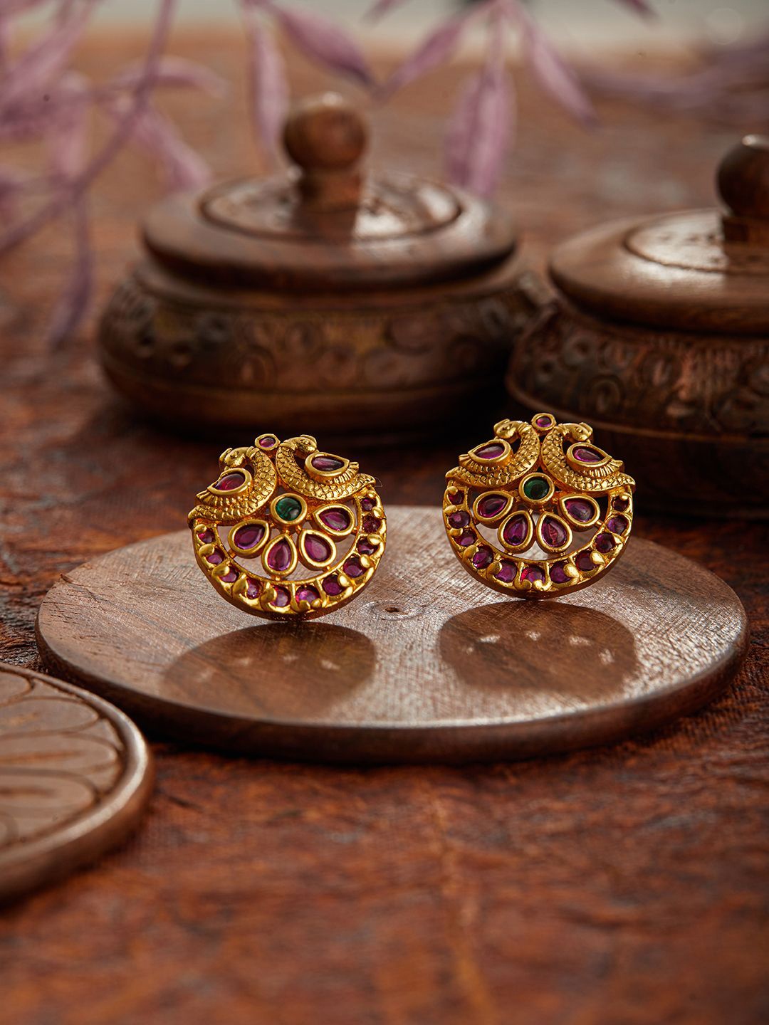 Jazz and Sizzle 24CT Gold Plated Ruby & American Diamond Peacock Shaped Temple Studs
Jazz and Sizzle 24CT Gold Plated Ruby & American Diamond Peacock Shaped Temple Studs