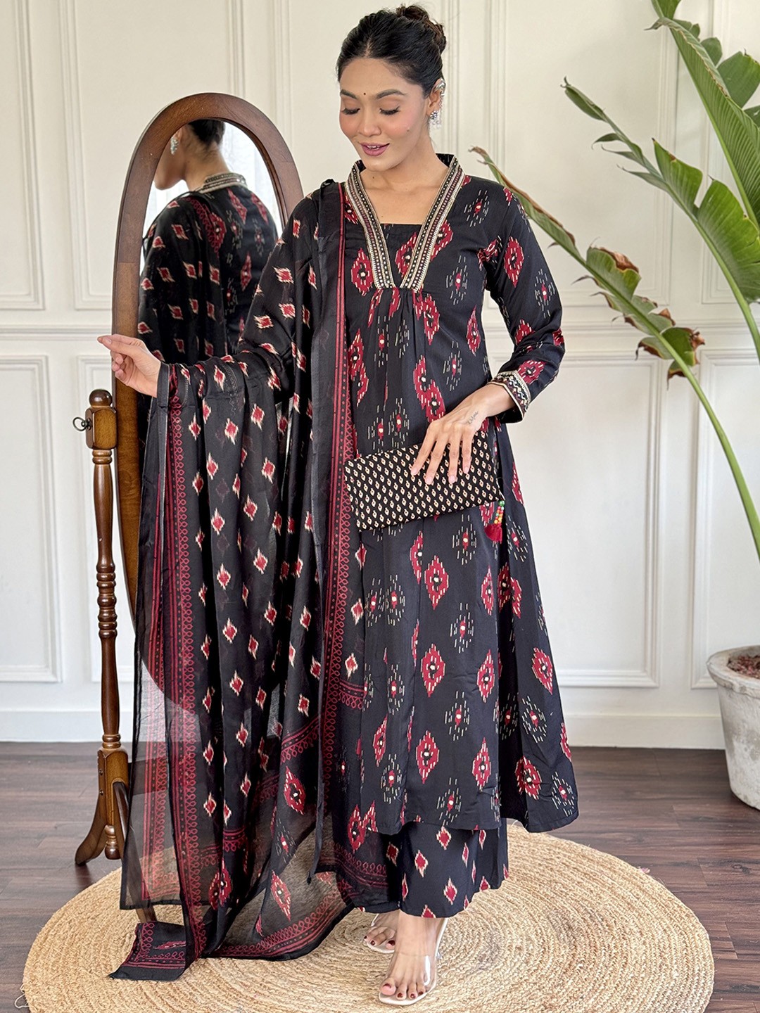 KALINI Ikat Abstract Printed Mirror Work Cotton A-Line Kurta with Trouser & Dupatta, Black
KALINI Ikat Abstract Printed Mirror Work Cotton A-Line Kurta with Trouser & Dupatta, Black