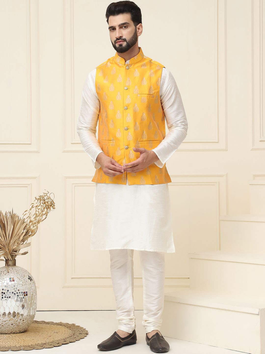 SOJANYA Mandarin Collar Silk Cotton Straight Kurta with Churidar & Nehru jacket, Cream
SOJANYA Mandarin Collar Silk Cotton Straight Kurta with Churidar & Nehru jacket, Cream