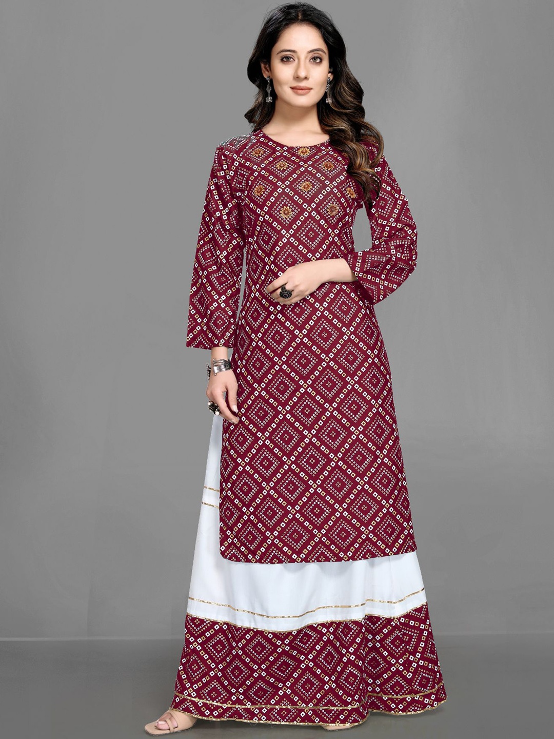 Queenswear Creation Women Maroon Ethnic Motifs Printed Beads and Stones Pure Cotton Kurta with Skirt
Queenswear Creation Women Maroon Ethnic Motifs Printed Beads and Stones Pure Cotton Kurta with Skirt