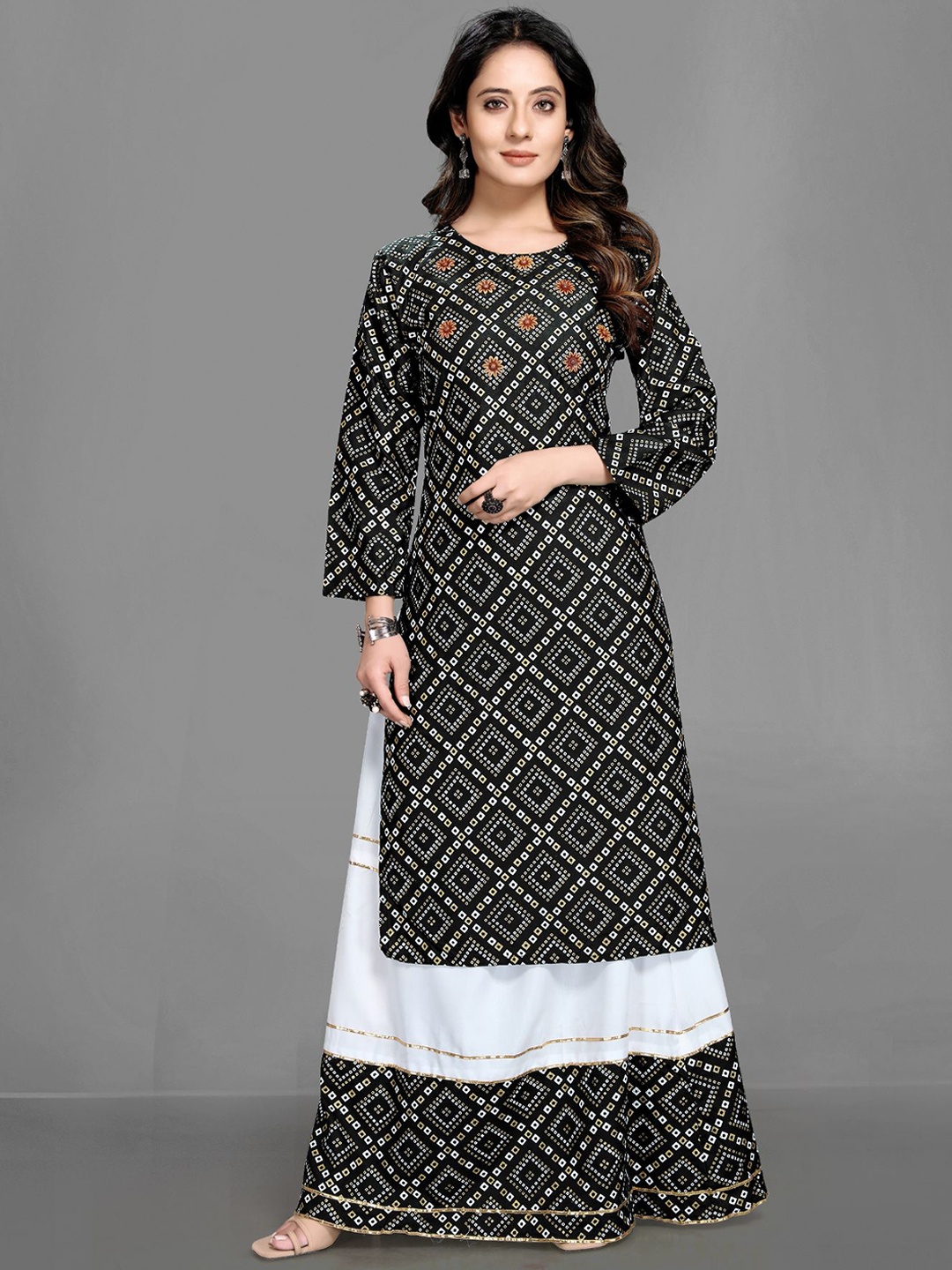 Queenswear Creation Women Black Ethnic Motifs Printed Beads and Stones Kurta with Skirt
Queenswear Creation Women Black Ethnic Motifs Printed Beads and Stones Kurta with Skirt