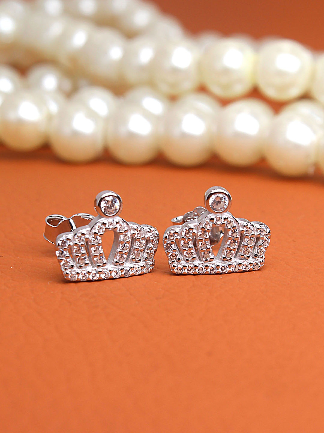 DEVASHREE 925 Sterling Silver Rhodium-Plated Cubic Zirconia Studded Crown Shaped Studs
DEVASHREE 925 Sterling Silver Rhodium-Plated Cubic Zirconia Studded Crown Shaped Studs